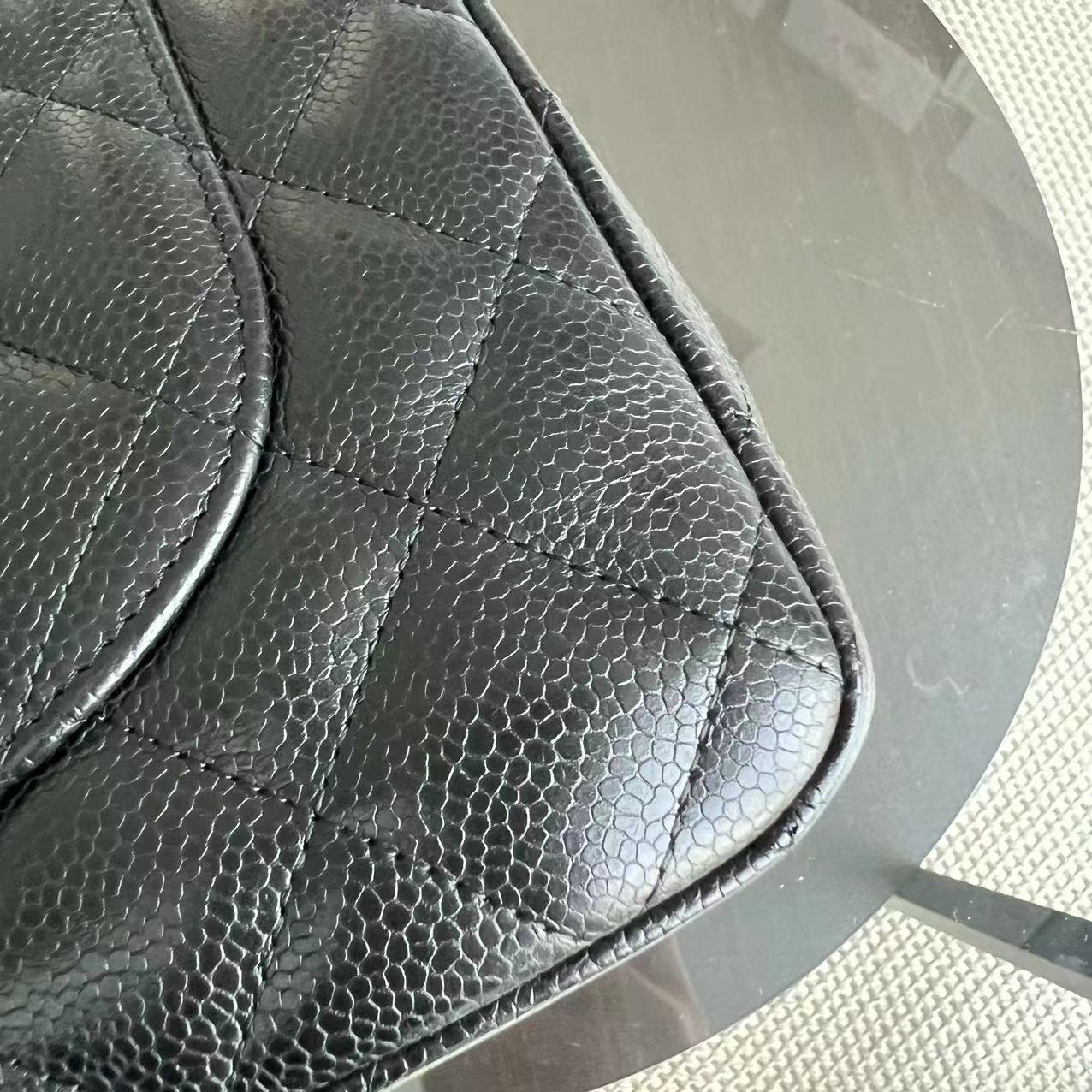 Chanel Classic Caviar Jumbo Classic Flap Quilted Grained Calfskin Black Golden Hardware Series 12