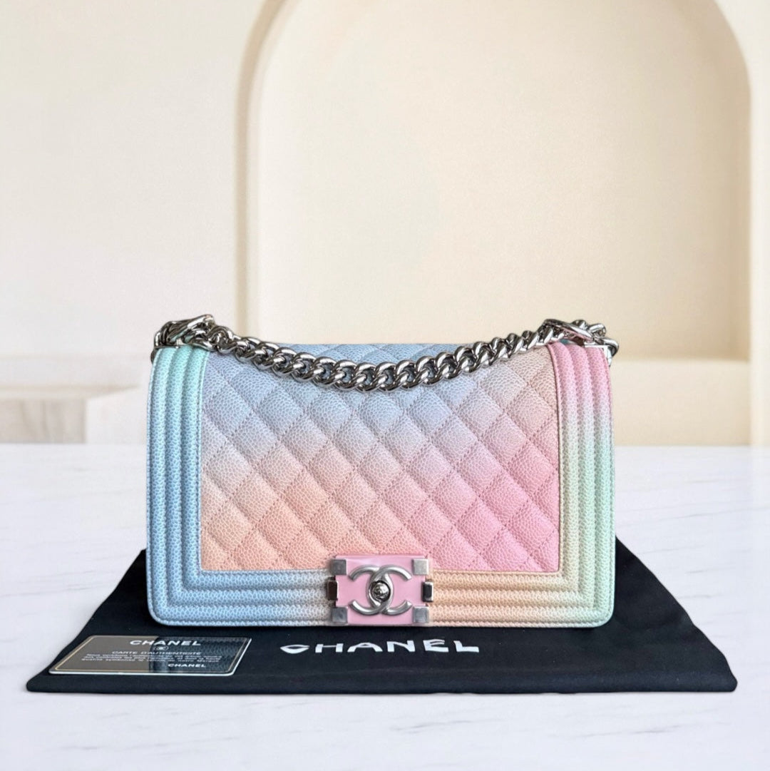 Chanel handbag with pastel gradient colors on a white background