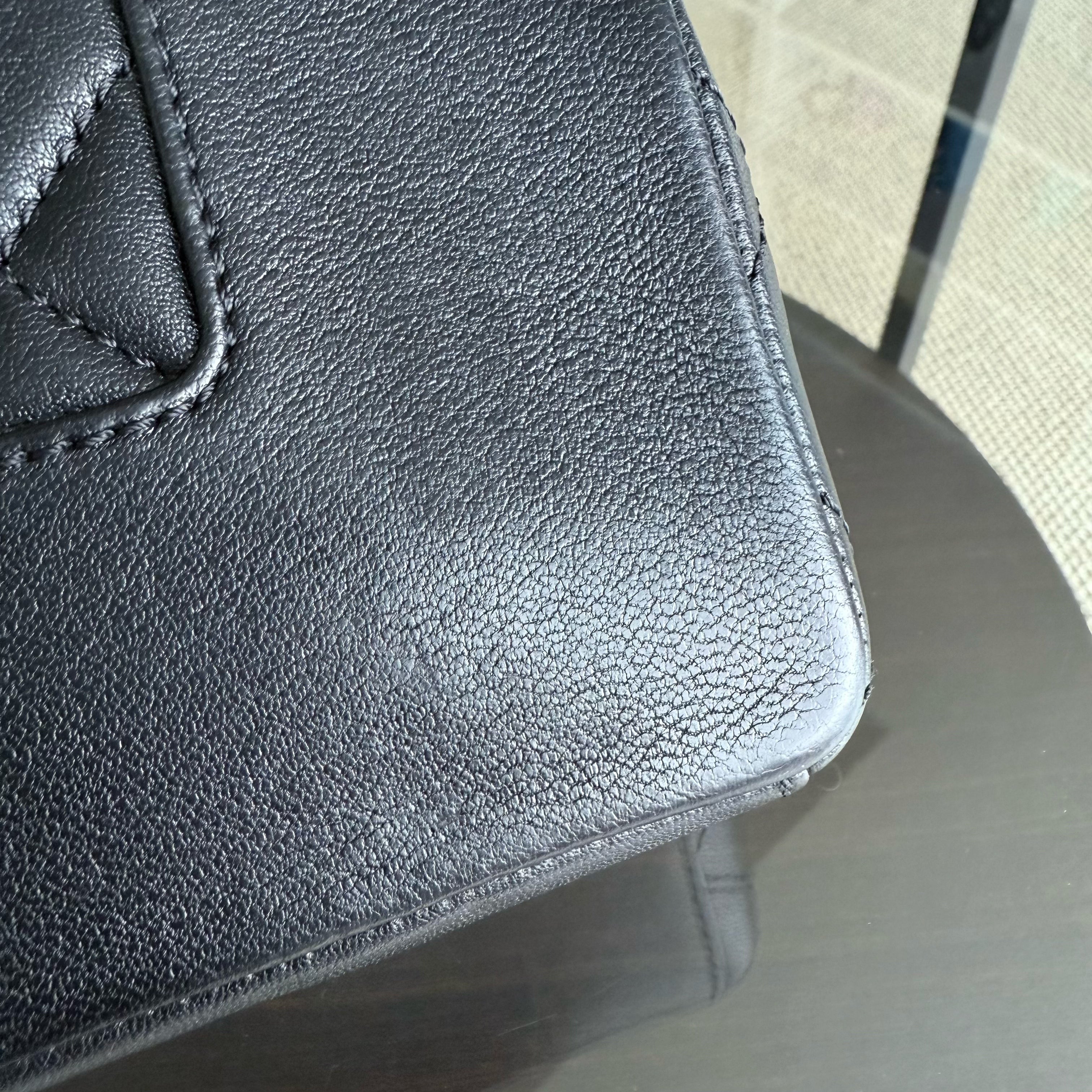 Chanel Seasonal Flap Mademoiselle - 25CM Quilted Lambskin Black Gold Hardware Series 23