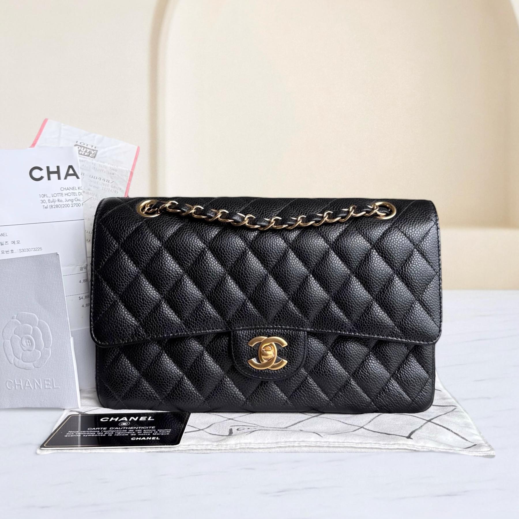 Chanel Classic Flap Medium - Caviar 25CM Quilted Grained Calfskin Black Gold Hardware Series 25