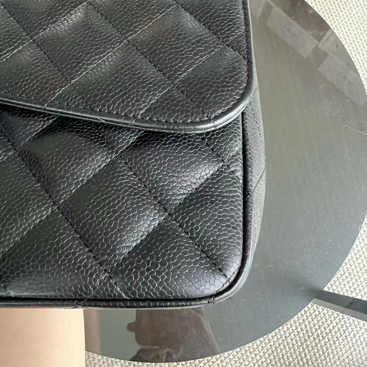 Chanel Classic Caviar Jumbo Classic Flap Quilted Grained Calfskin Black Golden Hardware Series 12