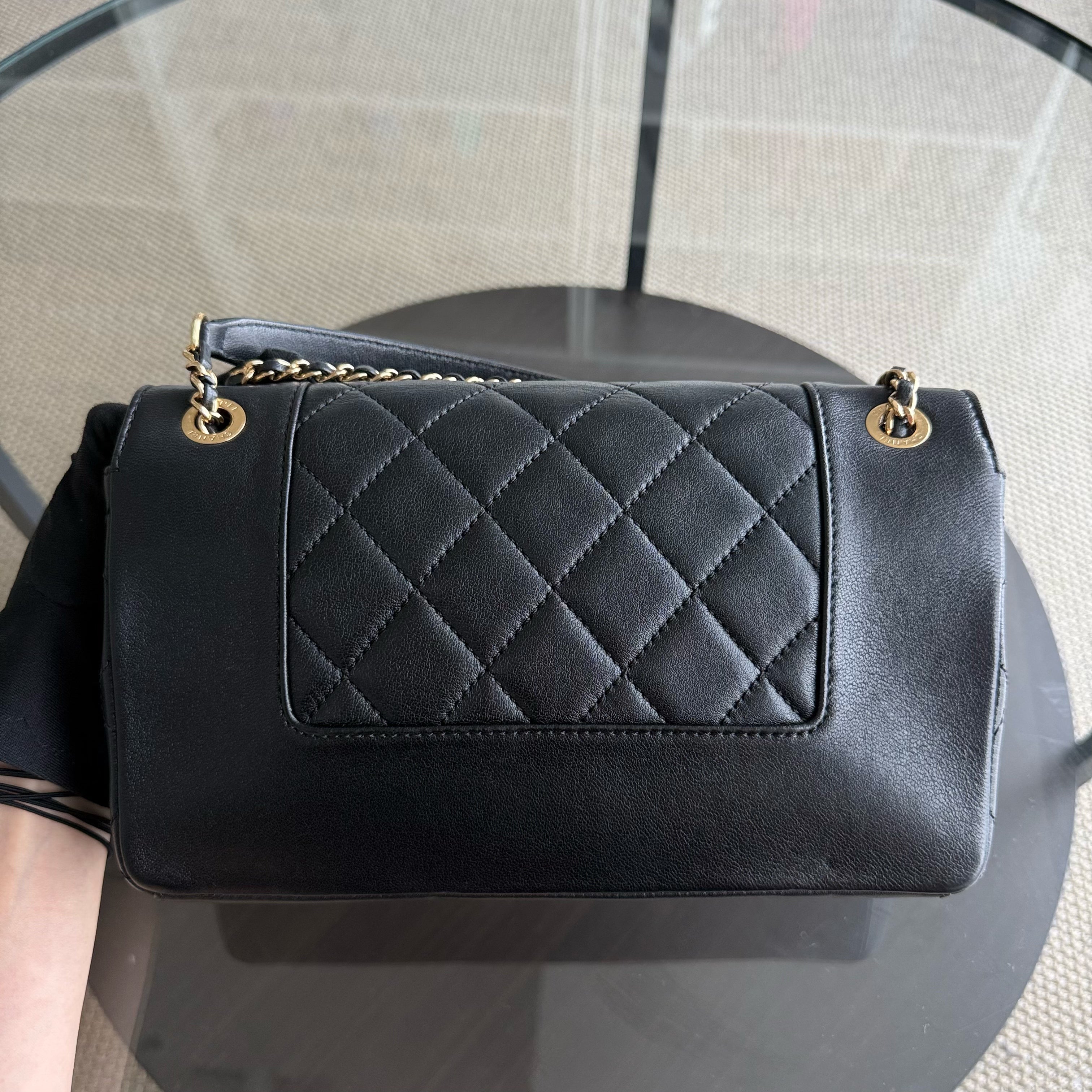 Chanel Seasonal Flap Mademoiselle - 25CM Quilted Lambskin Black Gold Hardware Series 23