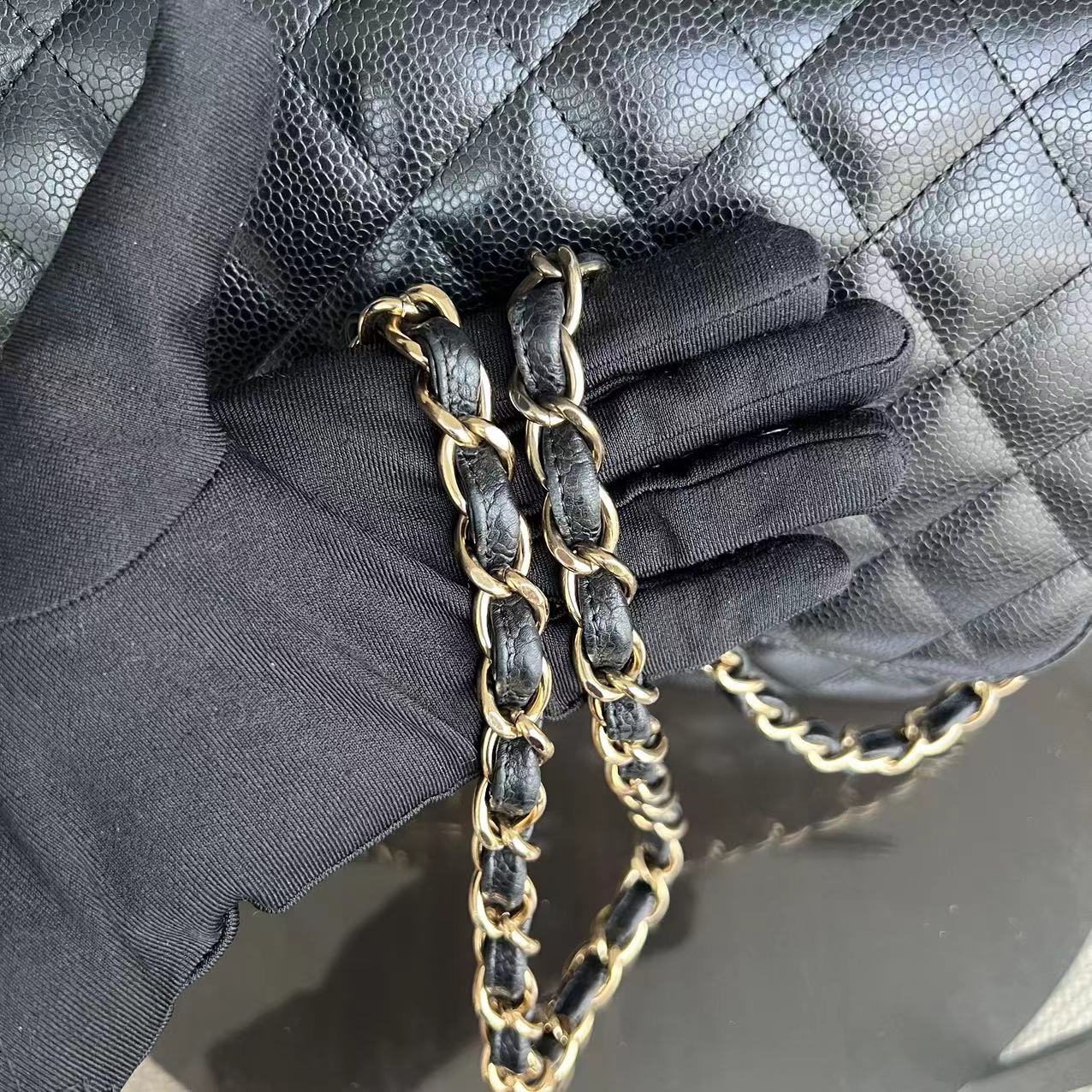 Chanel Classic Caviar Jumbo Classic Flap Quilted Grained Calfskin Black Golden Hardware Series 12