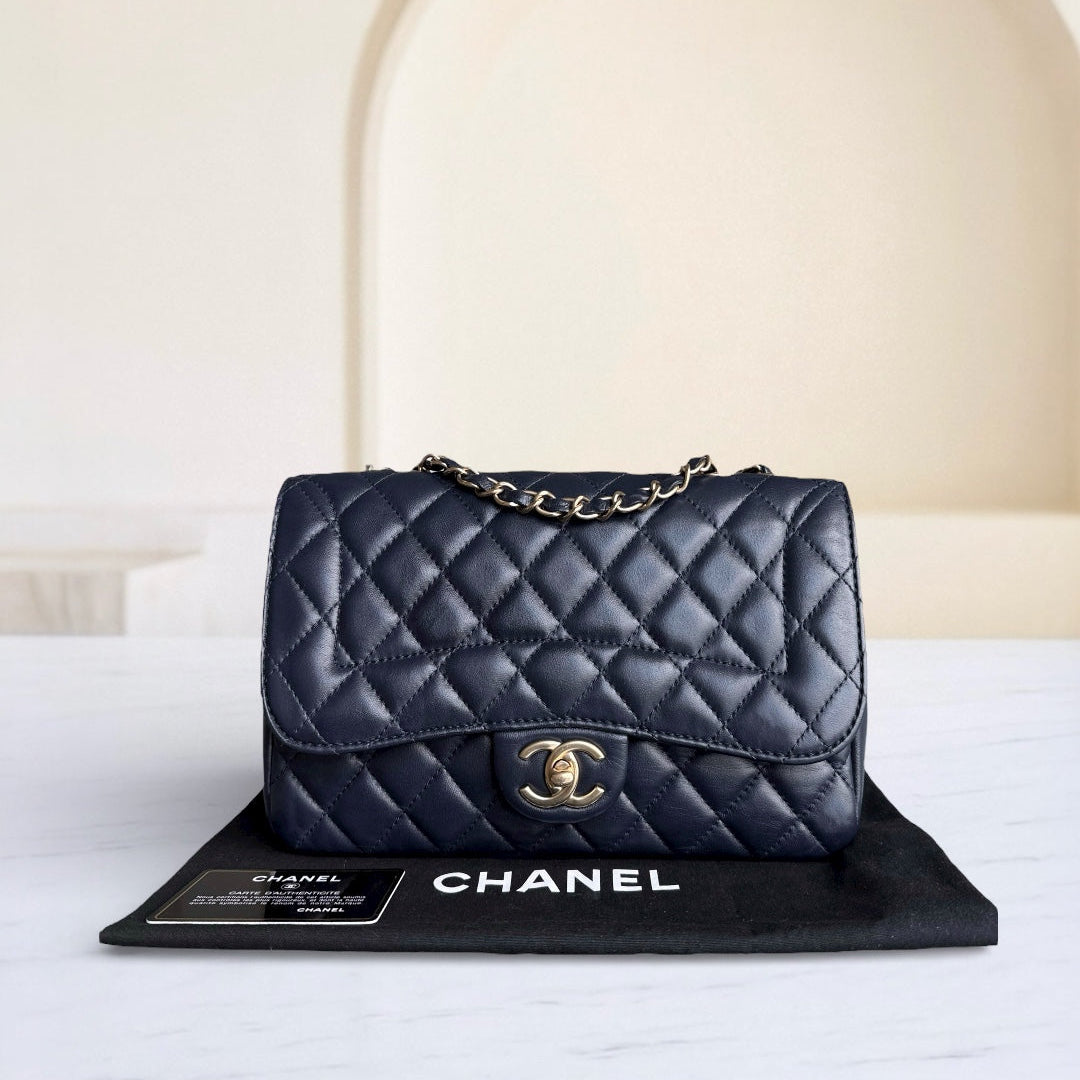 Chanel Chic Flap Seasonal Flap Medium - 25CM Quilted Lambskin Dark Blue Gold Hardware Series 21