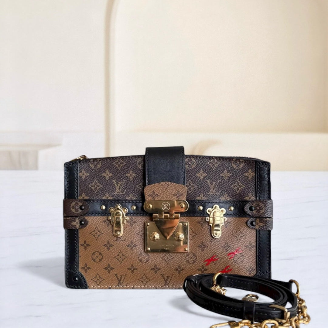 Louis Vuitton Trunk Clutch - Monogram Canvas Reverse Brown Gold hardware