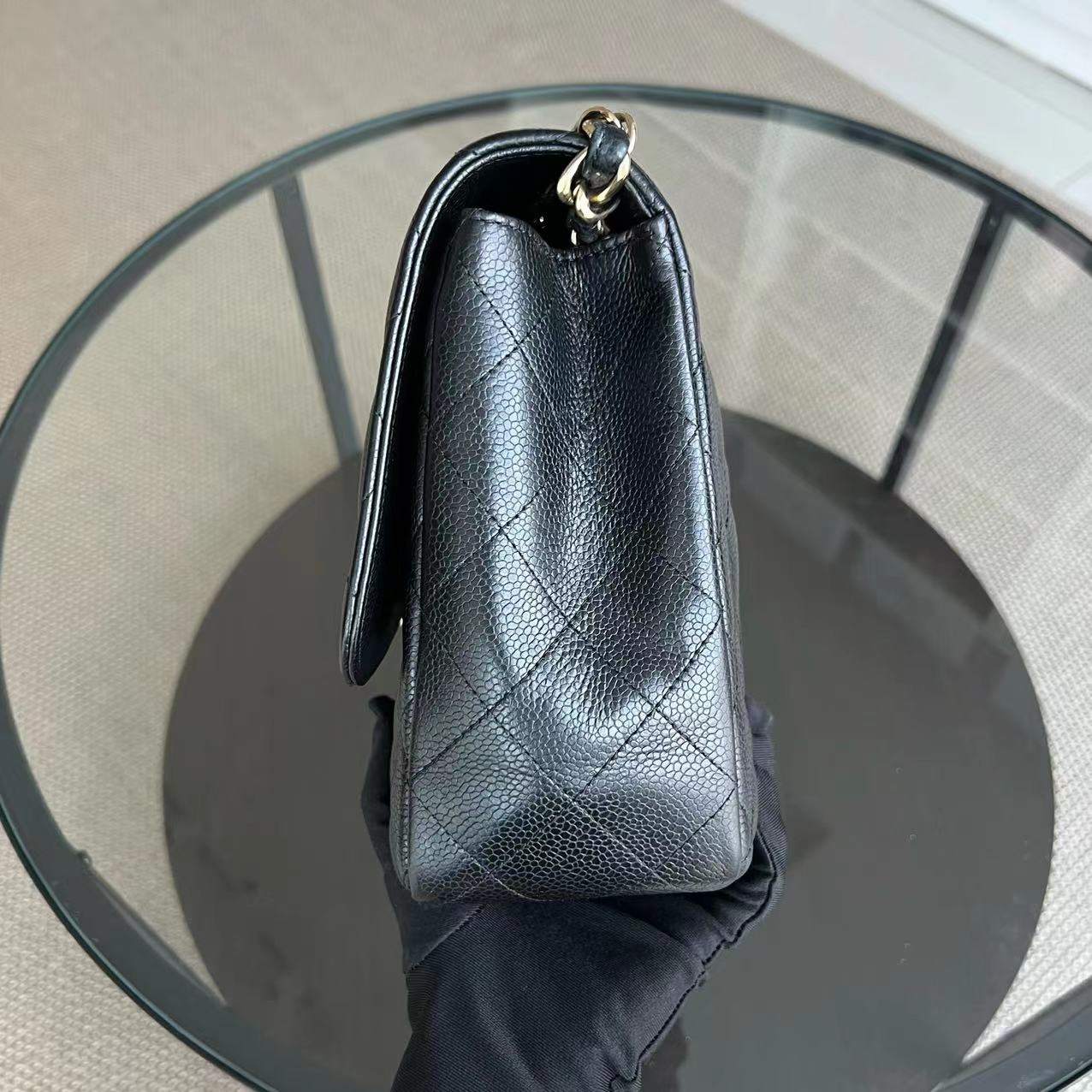 Chanel Classic Caviar Jumbo Classic Flap Quilted Grained Calfskin Black Golden Hardware Series 12