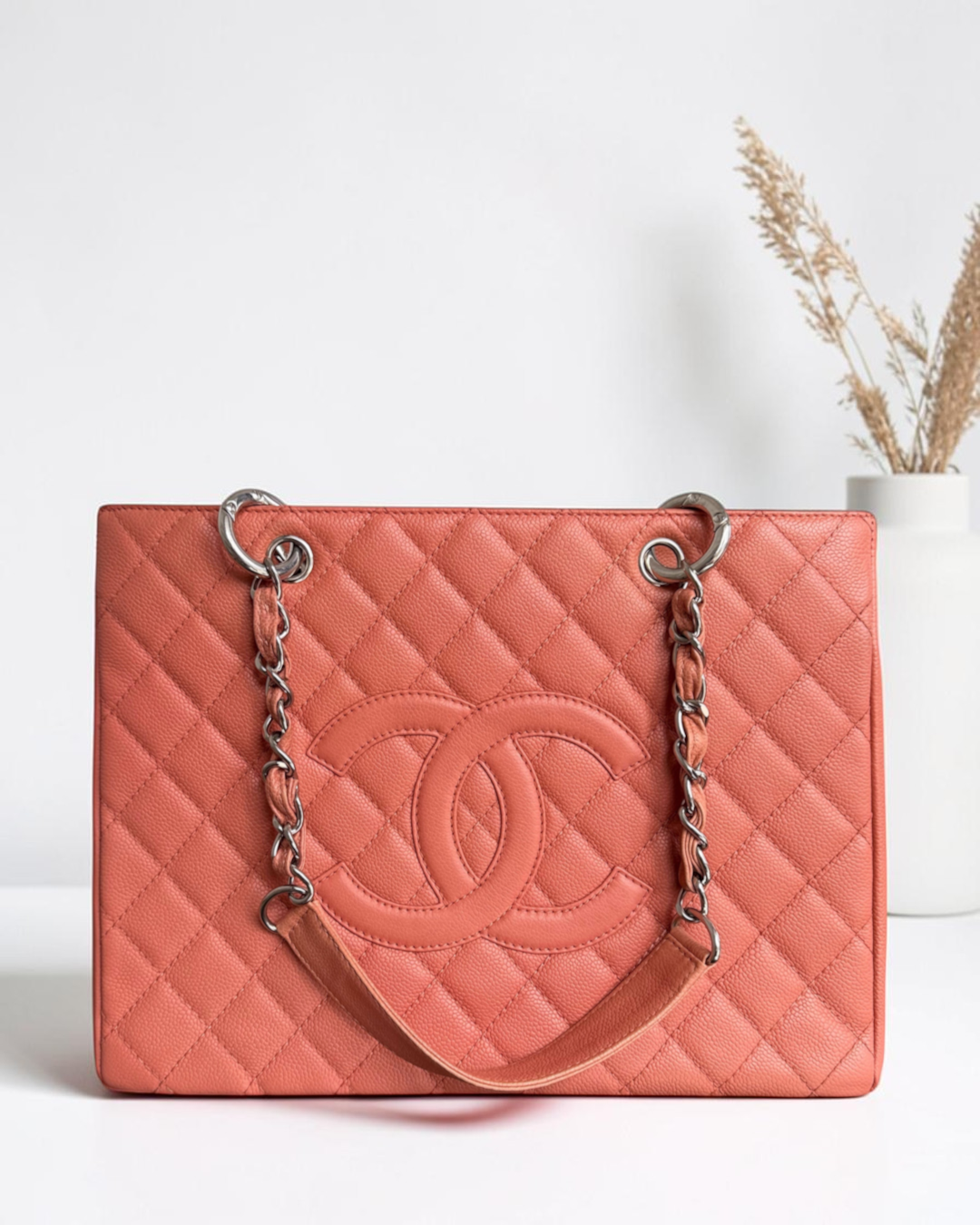 Luxury Evermore Chanel GST Grand Shopping Tote in blush quilted caviar leather with silver chain shoulder straps