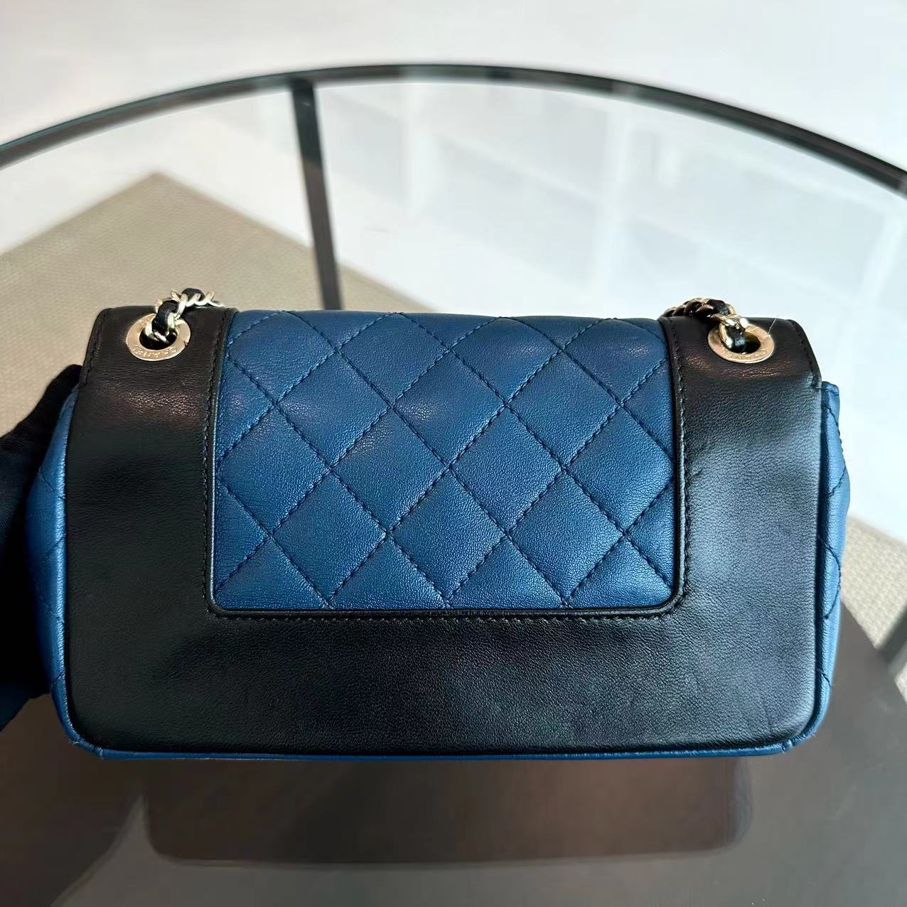 Chanel Seasonal Flap - Mademoiselle Small 20CM Calfskin Two-Tone Black Blue Golden Hardware Series 23