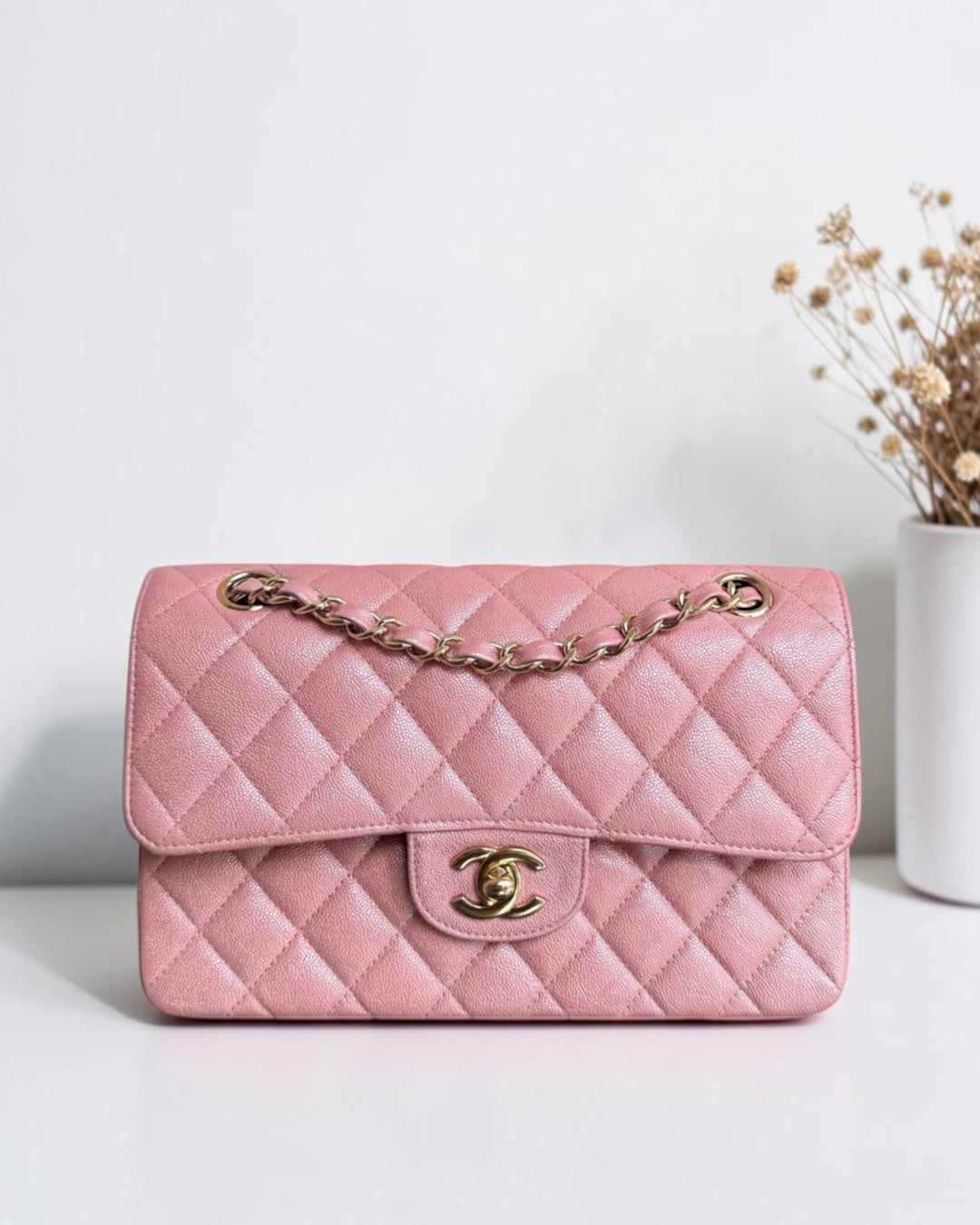Luxury Evermore pink quilted caviar leather Chanel classic flap bag with gold-tone chain strap and CC turn-lock