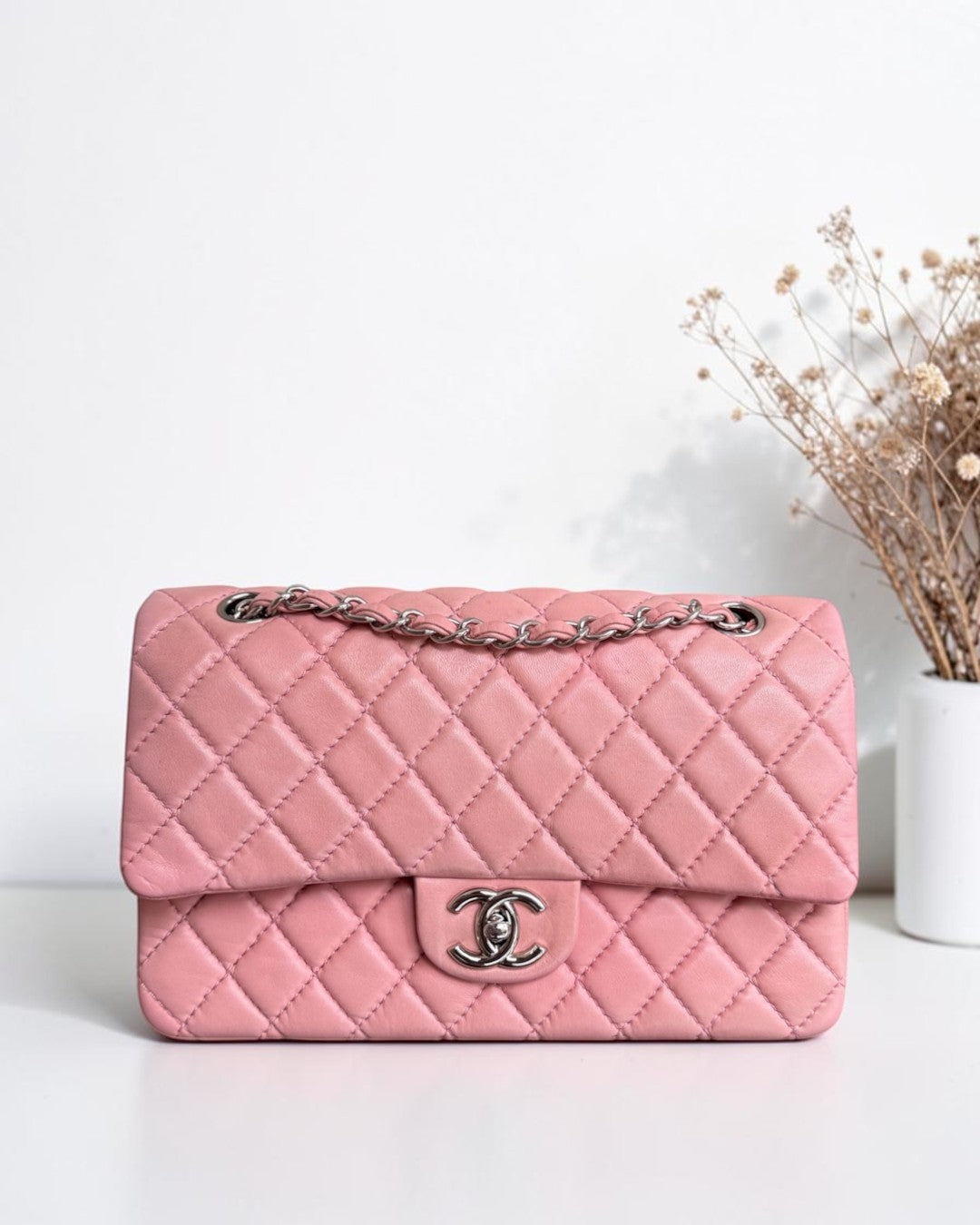 Luxury Evermore pink quilted leather classic flap bag with silver chain strap and CC logo clasp