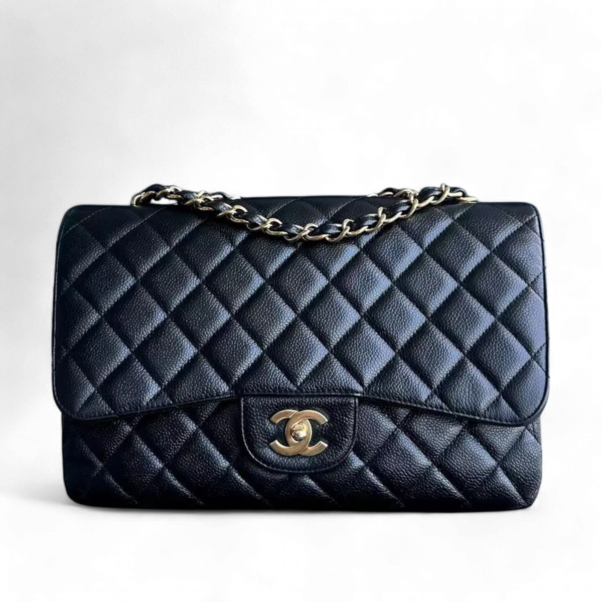 Chanel Classic Caviar Jumbo Classic Flap Quilted Grained Calfskin Black Golden Hardware Series 12