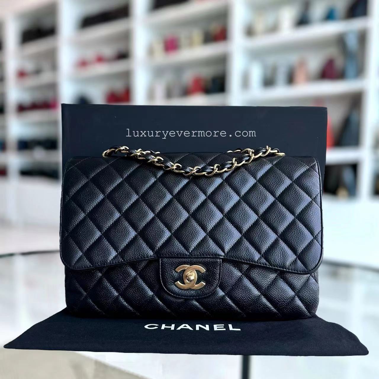 Chanel Classic Caviar Jumbo Classic Flap Quilted Grained Calfskin Black Golden Hardware Series 12