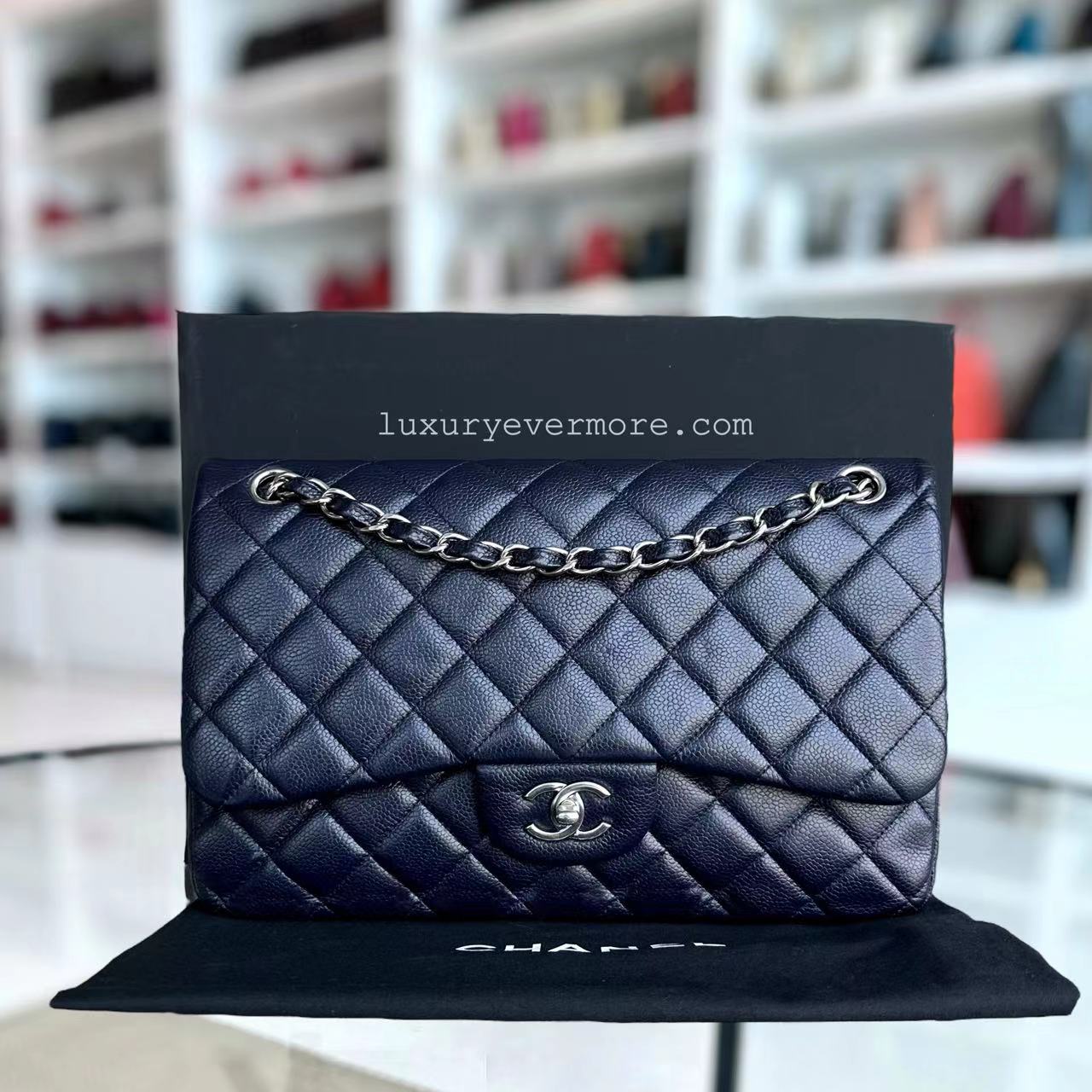 Caviar Jumbo Double Flap Classic Flap Quilted Grained Calfskin Dark Blue Silver Hardware Series 19