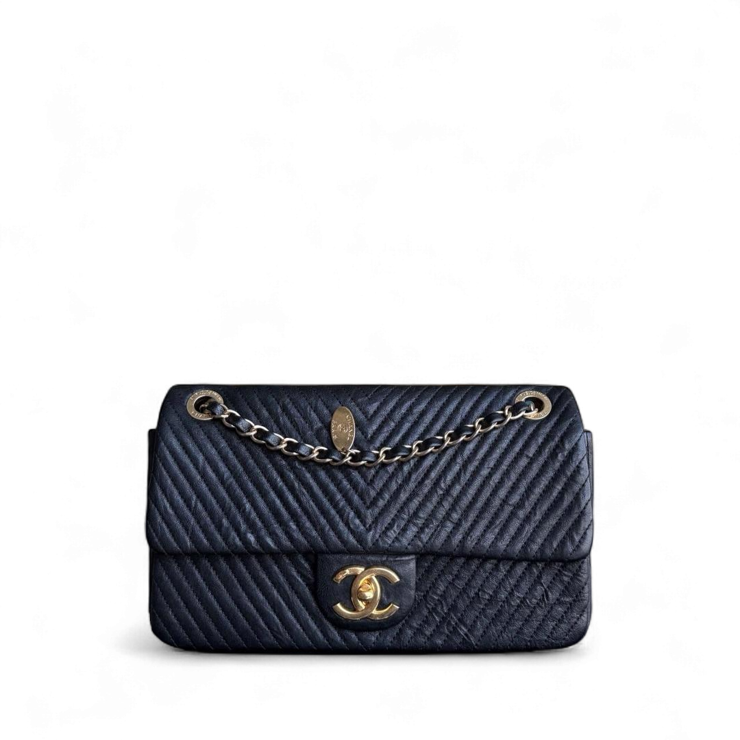 Chanel Seasonal Flap - Chevron Surpique CC Herringbone Medallion Calfskin Flap Black Gold Hardware Series 22