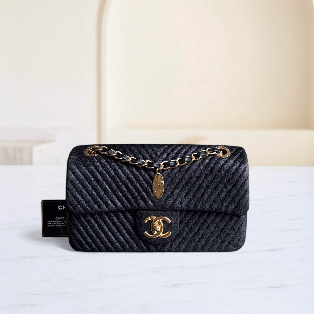 Chanel Seasonal Flap Small - 23CM Surpique CC Herringbone Medallion Flap Chevron Goatskin Black Gold Hardware Series 20