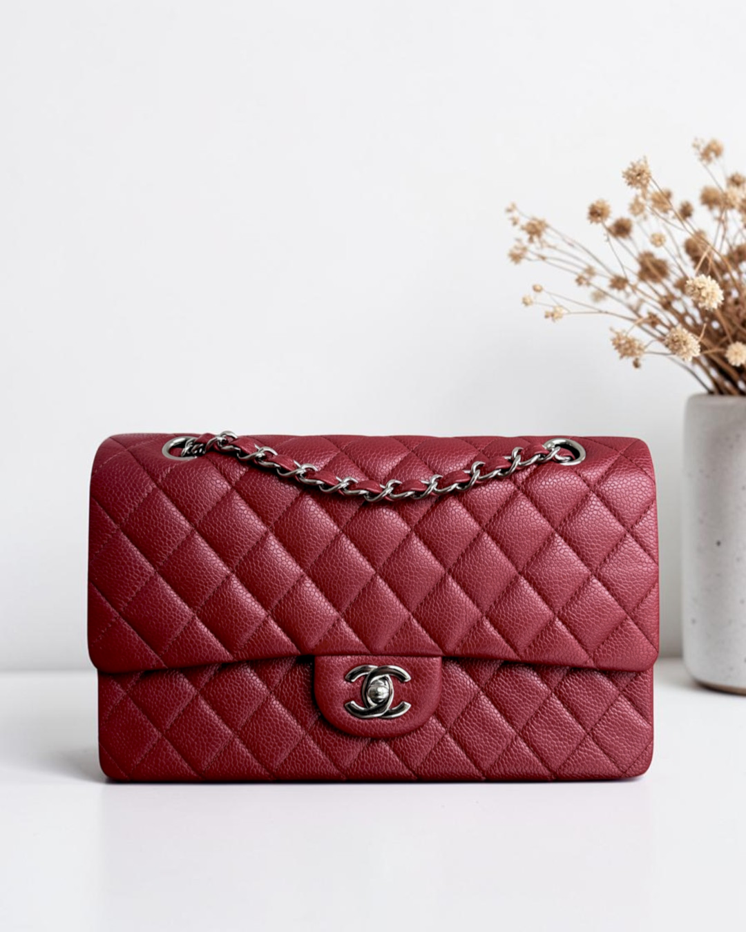 Luxury Evermore quilted red caviar leather Chanel classic flap bag with silver-tone chain strap and CC turn-lock