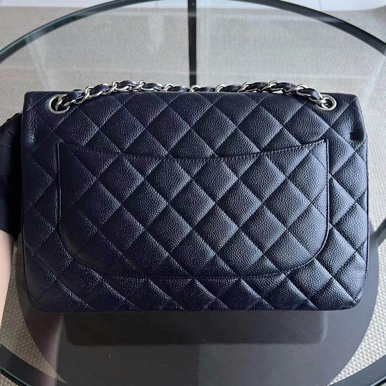 Caviar Jumbo Double Flap Classic Flap Quilted Grained Calfskin Dark Blue Silver Hardware Series 19