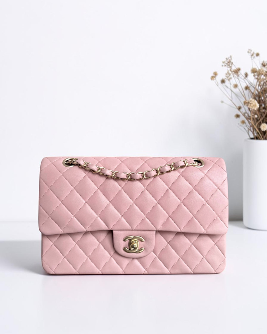 Luxury Evermore light pink quilted leather classic flap handbag with gold chain strap and CC turn-lock closure