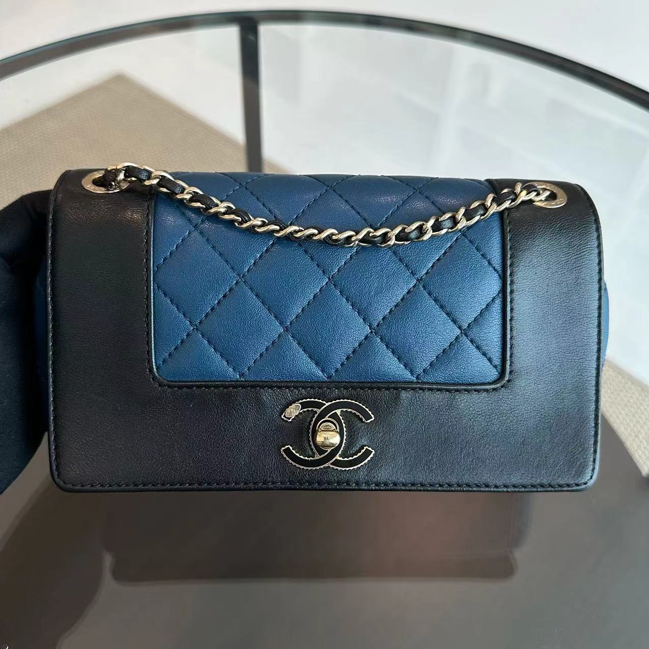 Chanel Seasonal Flap Mademoiselle Small 20CM Calfskin Two-Tone Black Blue Golden Hardware Series 23