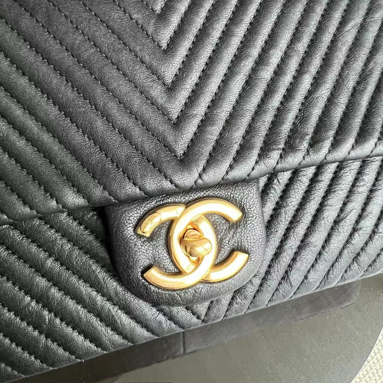 Chanel Medium Herringbone Seasonal Flap Black Aged Calfskin Golden Hardware Series 19