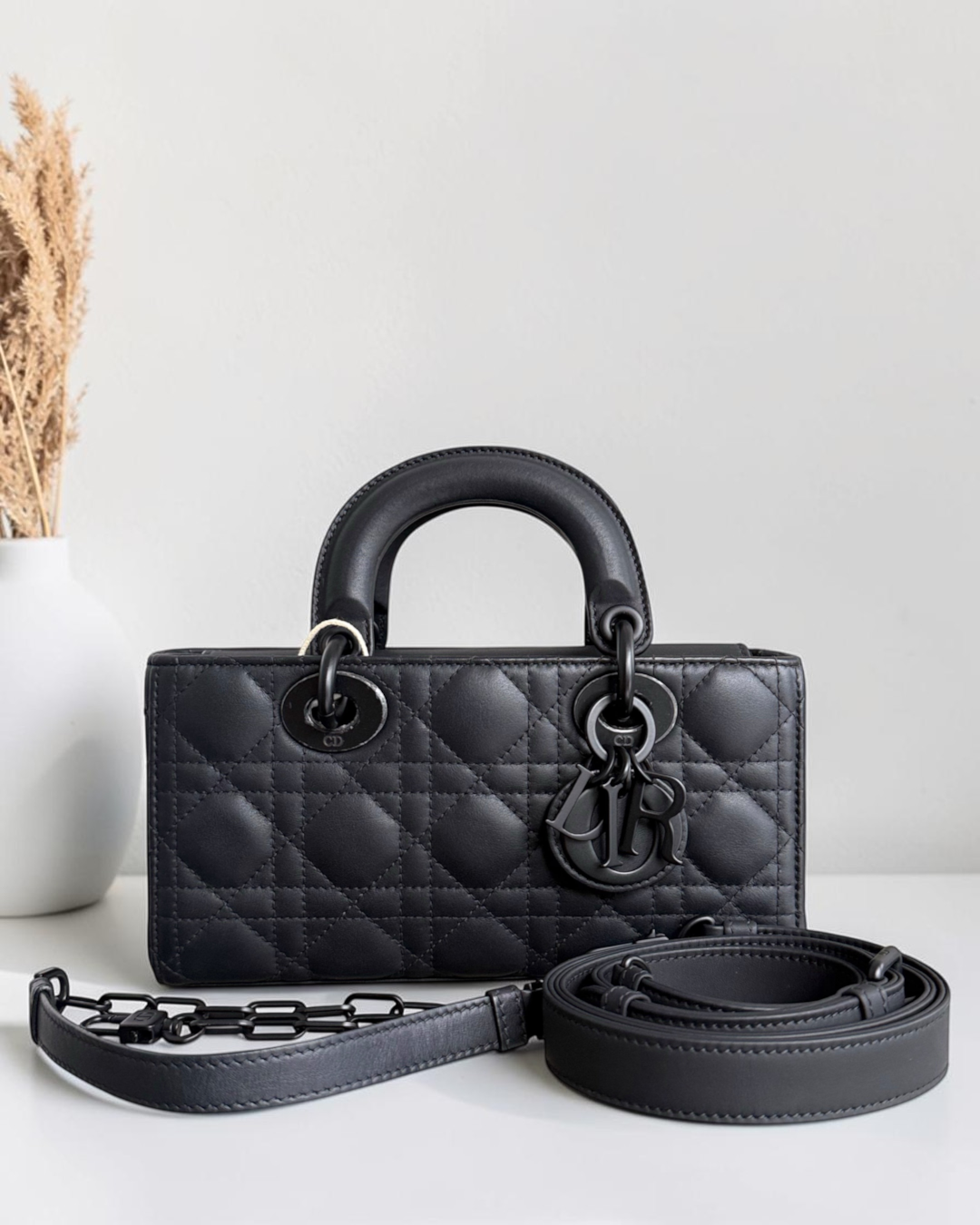 Luxury Evermore small black quilted leather Lady Dior handbag with matte black hardware and detachable shoulder strap