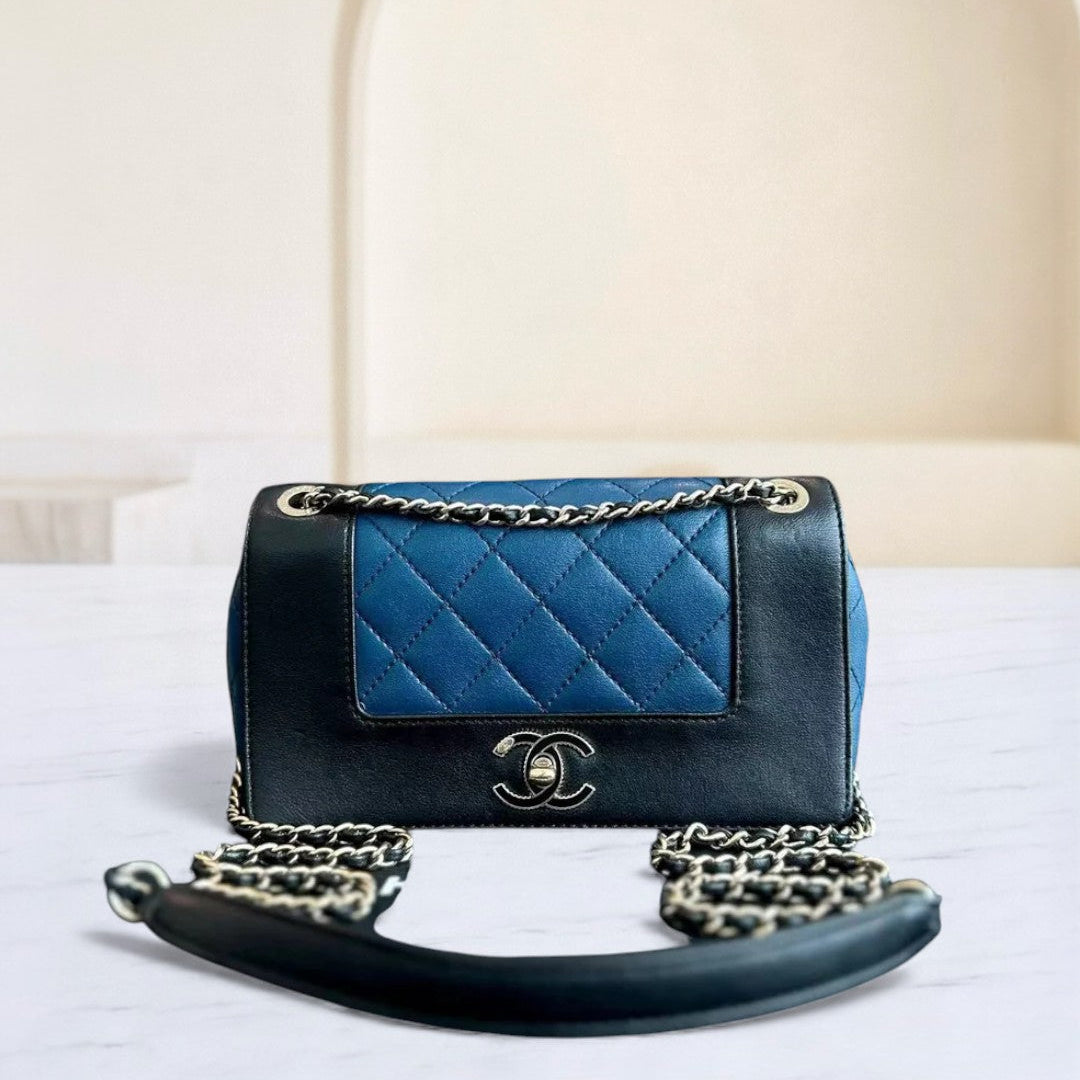 Chanel Seasonal Flap - Mademoiselle Small 20CM Calfskin Two-Tone Black Blue Golden Hardware Series 23