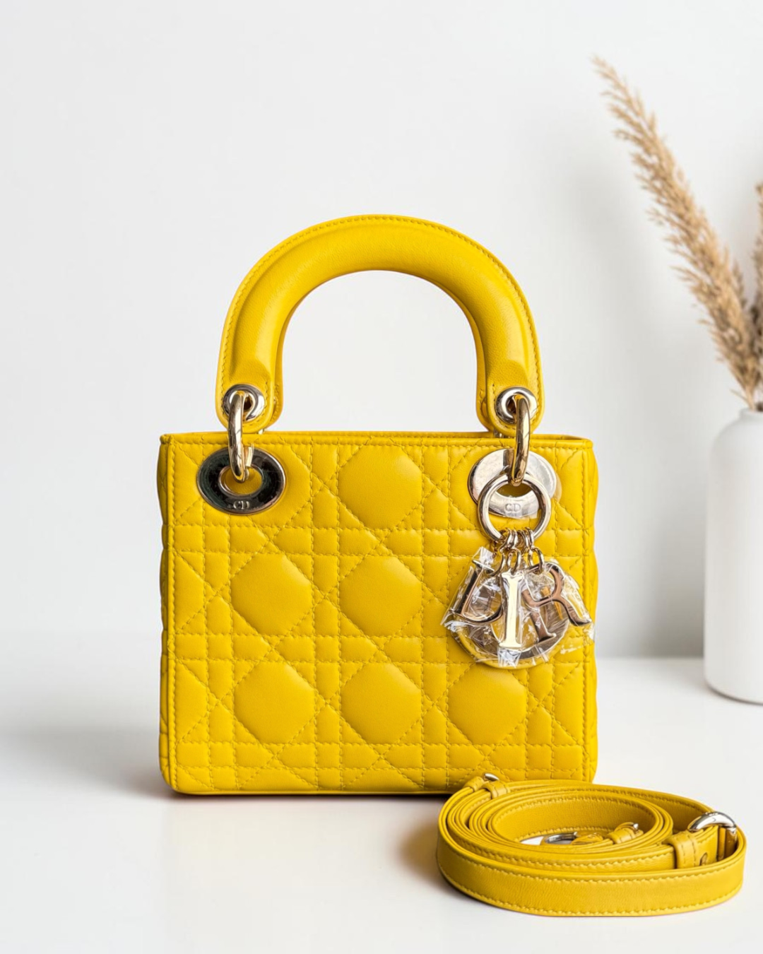 Luxury Evermore yellow lambskin Lady Dior Mini bag with signature cannage stitching and gold-tone hardware