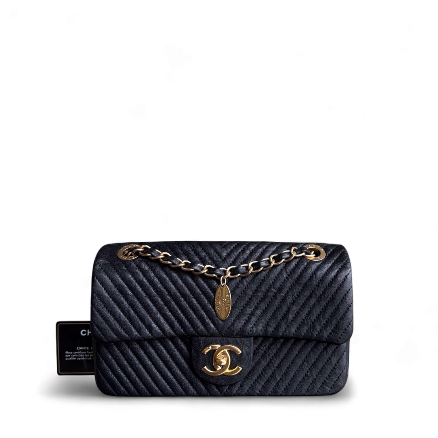 Chanel Seasonal Flap Small - 23CM Surpique CC Herringbone Medallion Flap Chevron Goatskin Black Gold Hardware Series 20