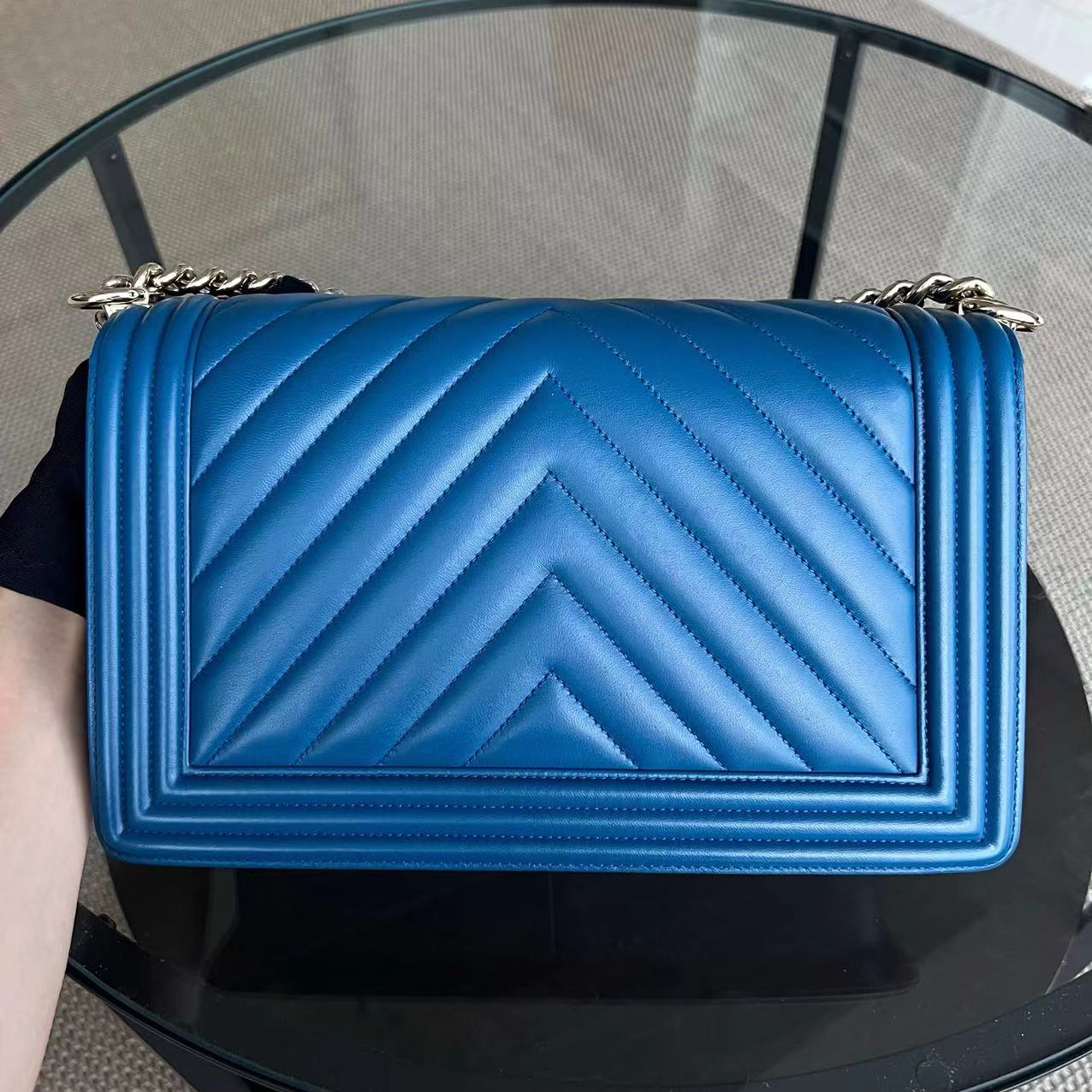 Chanel Boy New Medium 28CM Chevron Smooth Calfskin Blue Golden Hardware Series 24 - Luxury Evermore