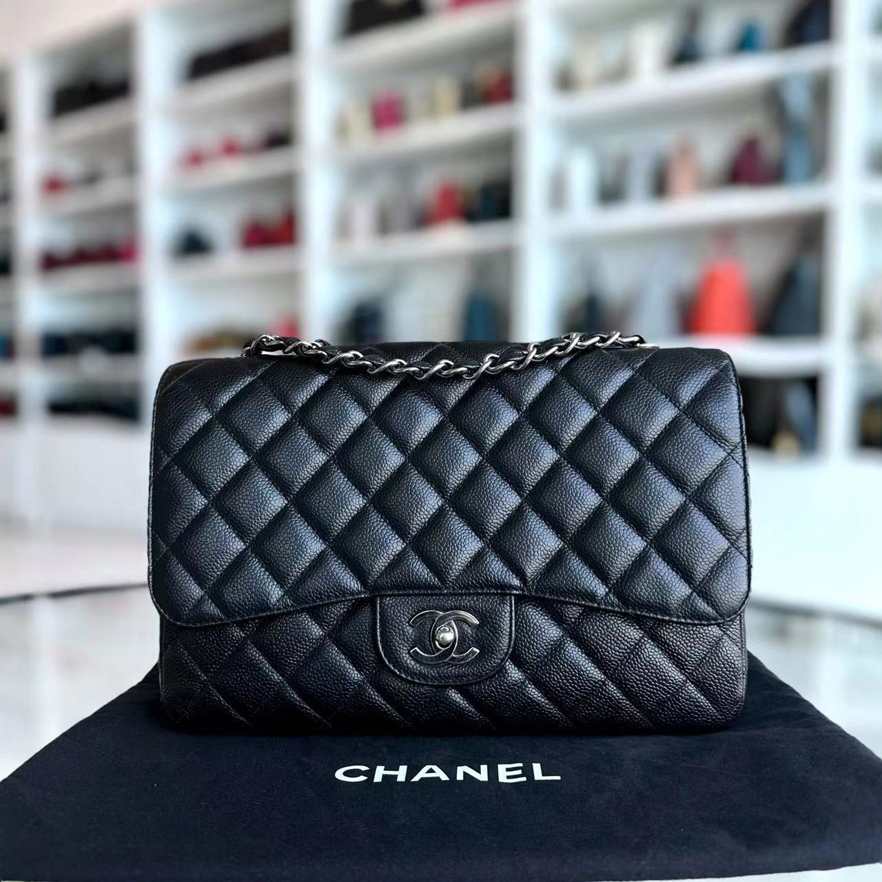 Chanel Caviar Jumbo Classic Flap Quilted Grained Calfskin Black Silver Hardware Series 12 - Luxury Evermore