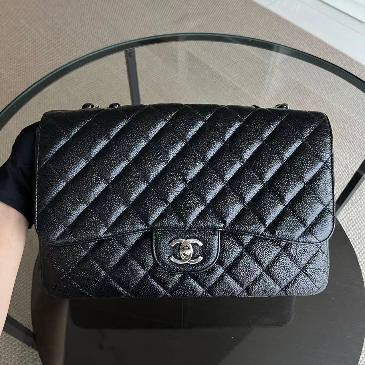 Chanel Caviar Jumbo Classic Flap Quilted Grained Calfskin Black Silver Hardware Series 12 - Luxury Evermore