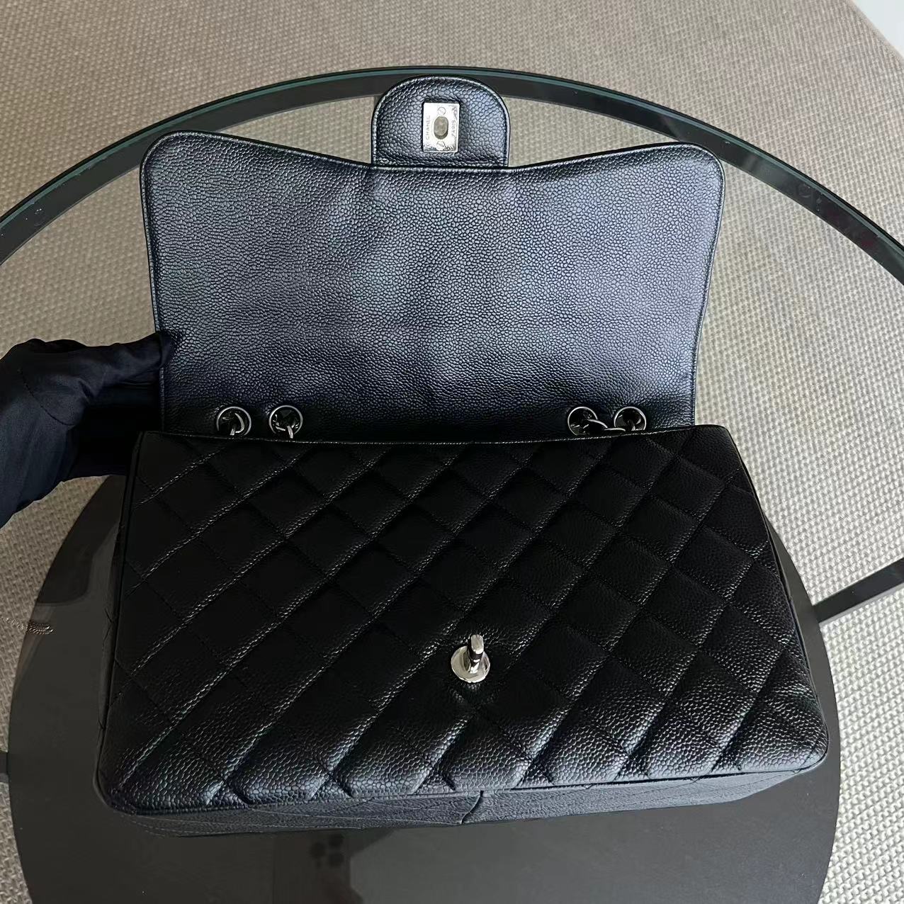 Chanel Caviar Jumbo Classic Flap Quilted Grained Calfskin Black Silver Hardware Series 12 - Luxury Evermore