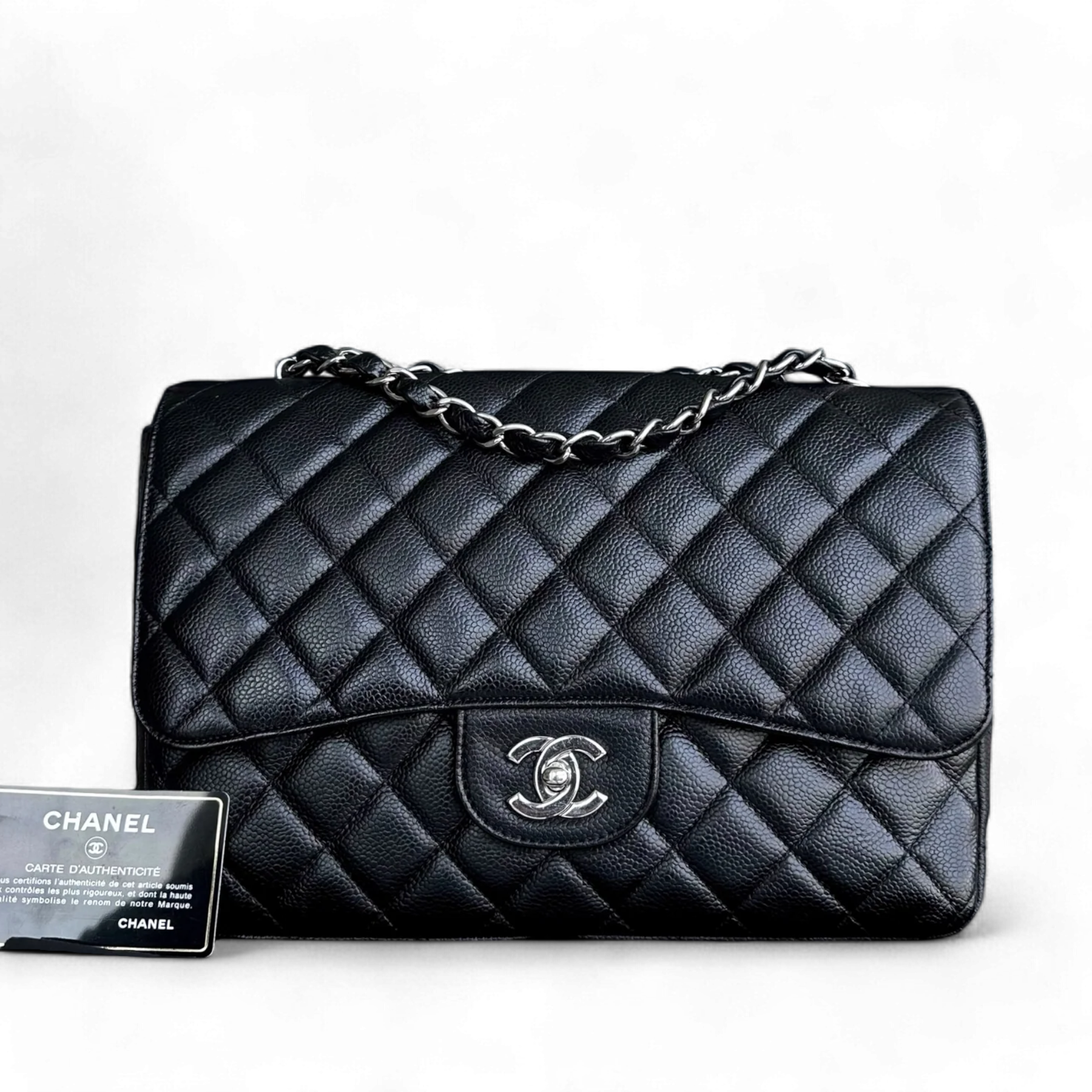 Chanel Caviar Jumbo Classic Flap Single Flap Quilted Grained Calfskin Black Silver Hardware Series 13