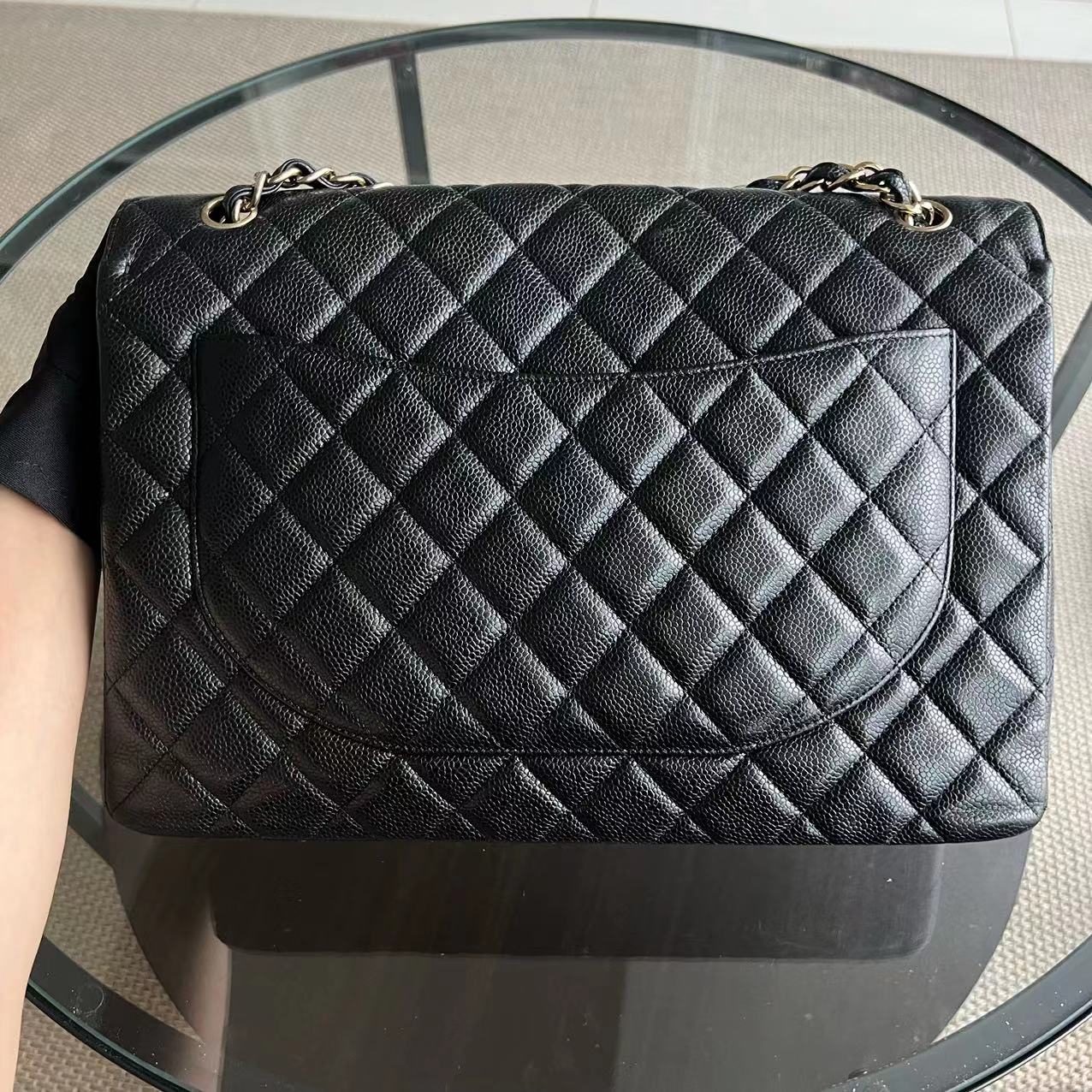 Chanel Caviar Maxi Classic Flap Single Flap Quilted Grained Calfskin Black Golden Hardware Series 13 - Luxury Evermore