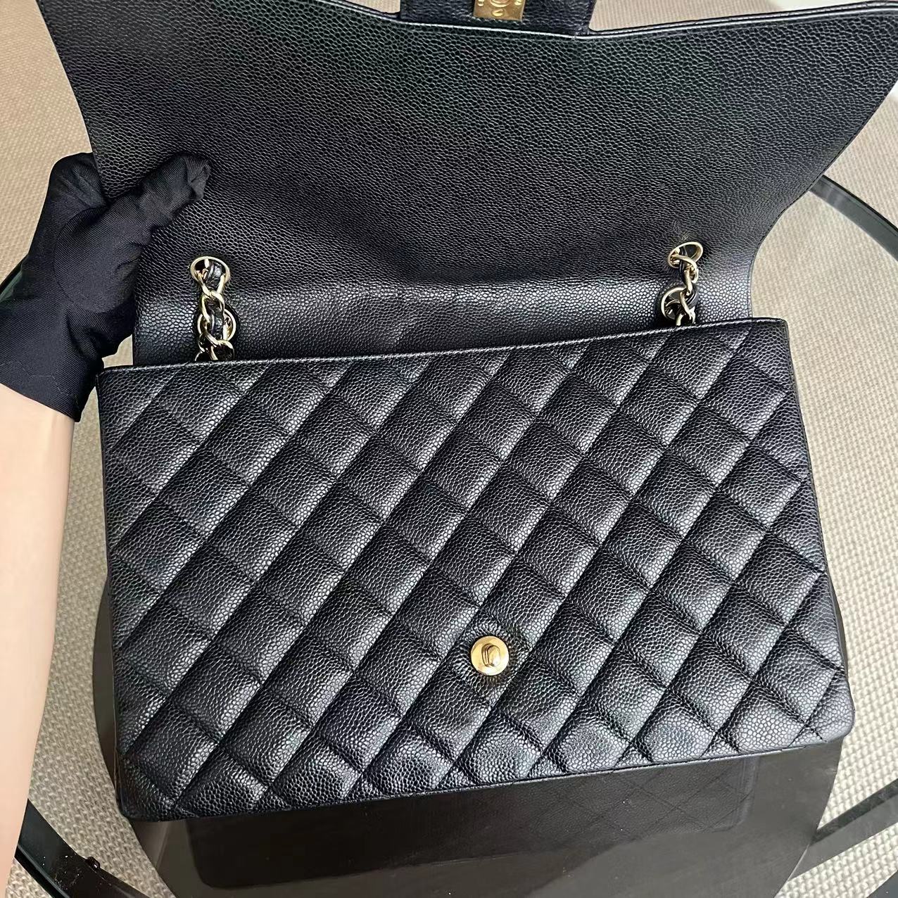 Chanel Caviar Maxi Classic Flap Single Flap Quilted Grained Calfskin Black Golden Hardware Series 13 - Luxury Evermore