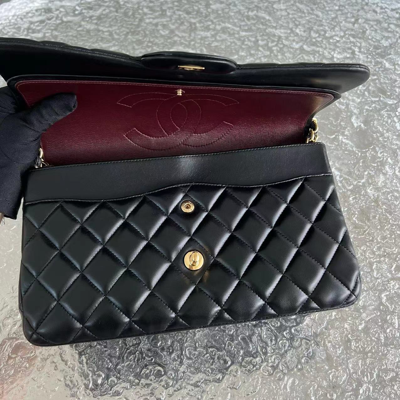 Chanel Jumbo Double Flap Classic Flap Quilted Lambskin Black Golden Hardware Series 16 - Luxury Evermore