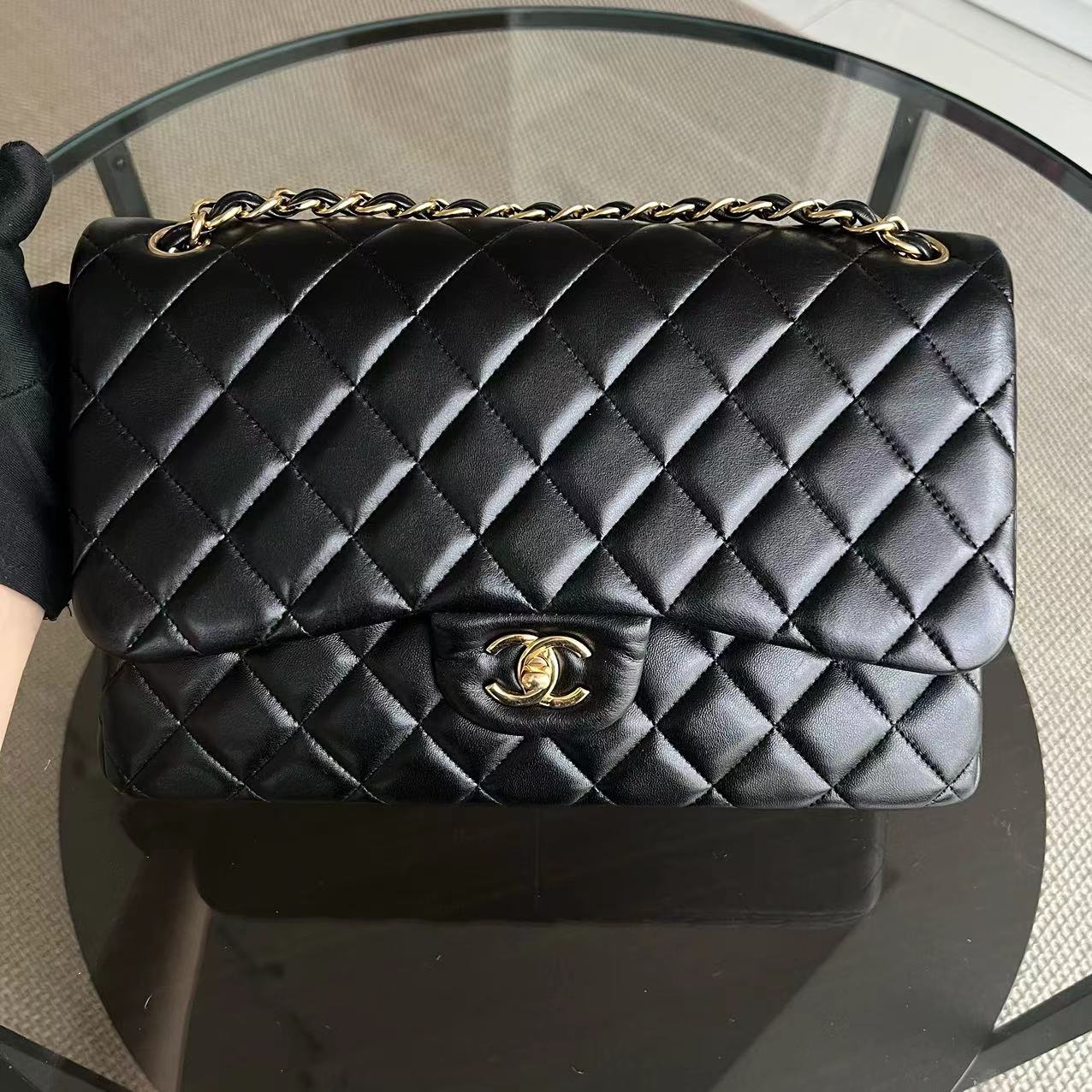 Chanel Jumbo Double Flap Classic Flap Quilted Lambskin Black Golden Hardware Series 22 - Luxury Evermore