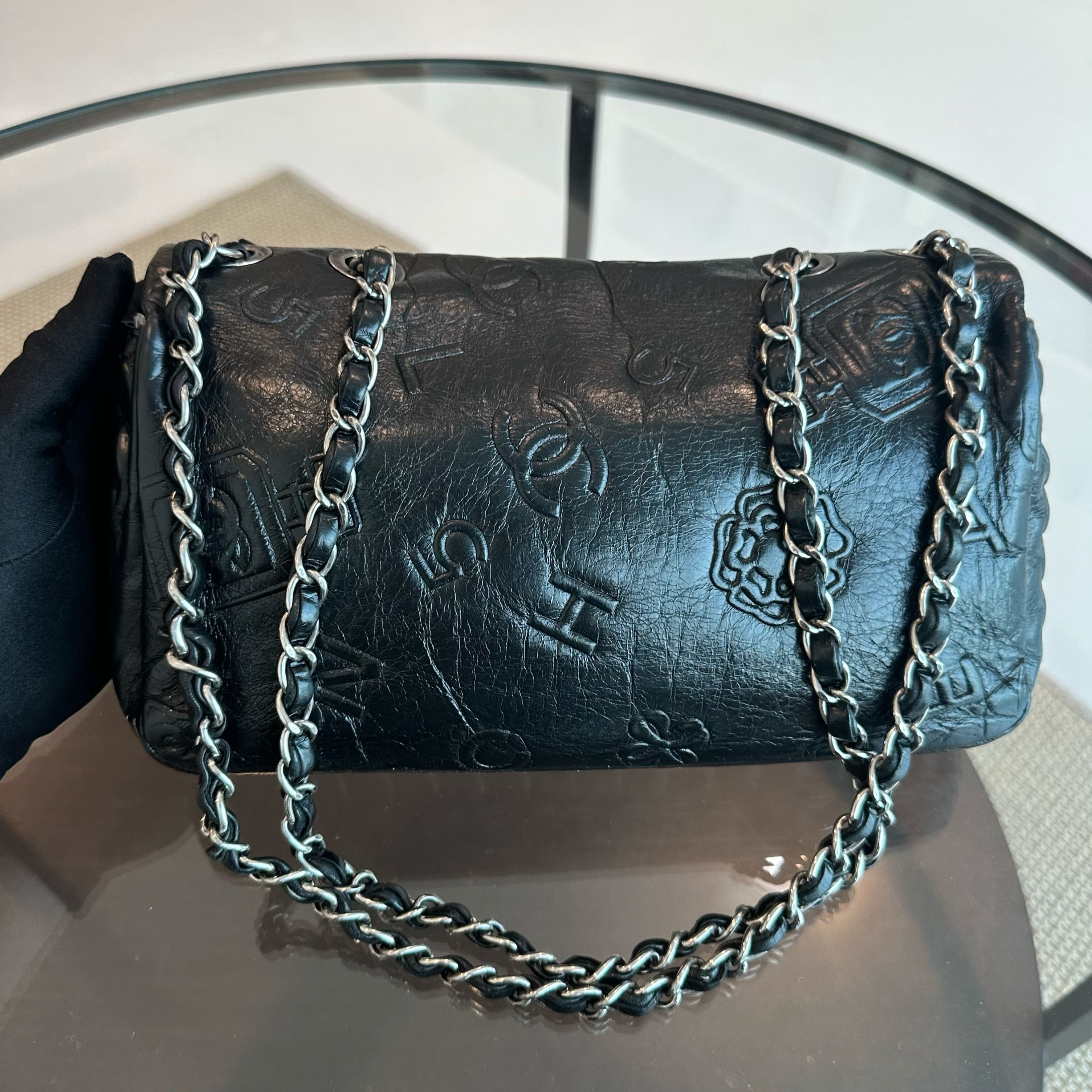 Chanel Seasonal Flap Previous Symbols Flap Bag Embossed Calfskin Black SHW No 19 - Luxury Evermore