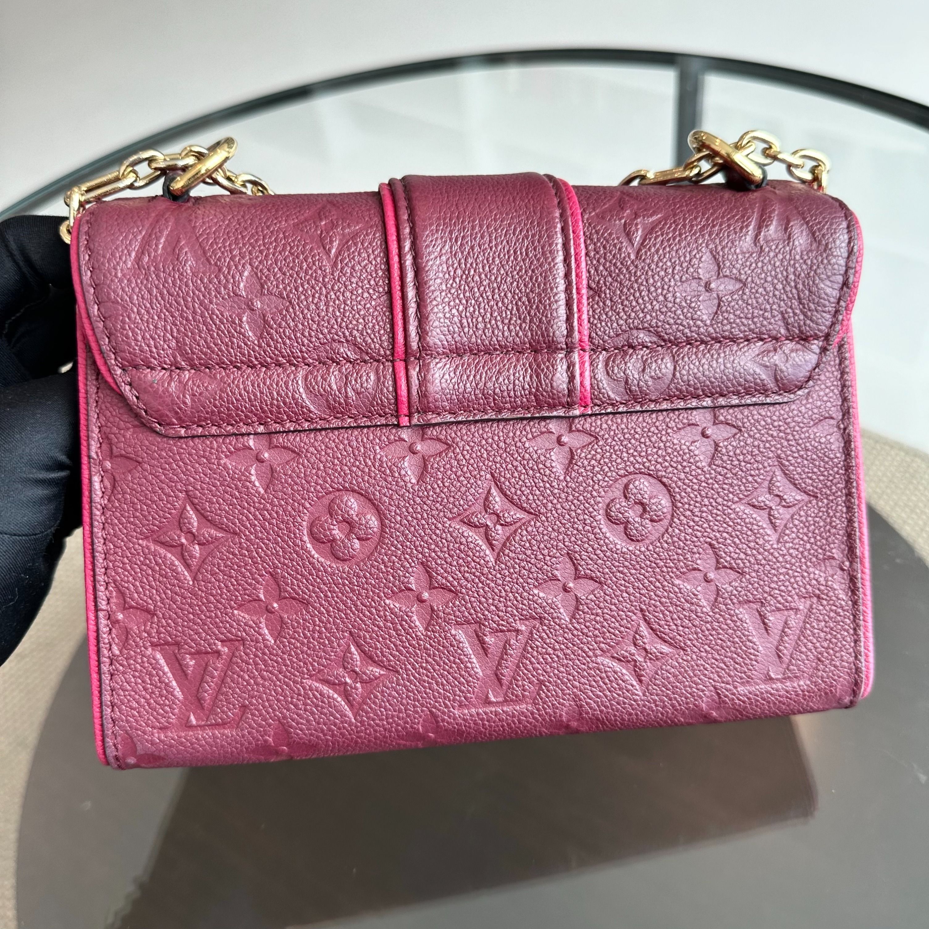 Louis Vuitton LV Saint Sulpice Empriente Raisin Monogram Red GHW - Luxury Evermore