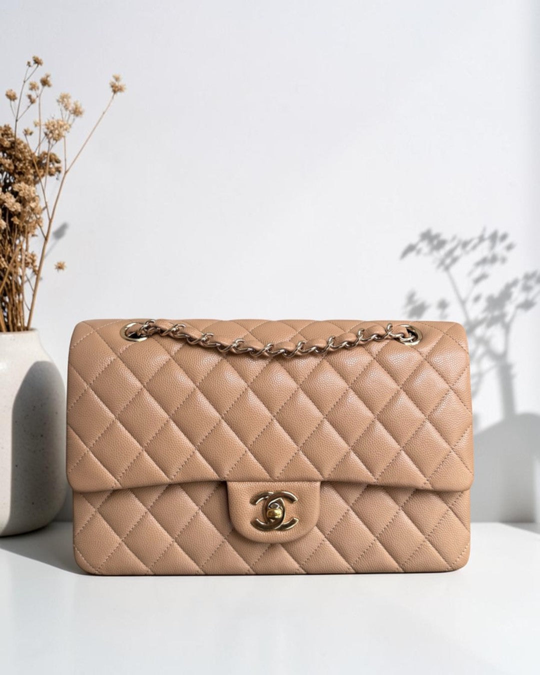 Luxury Evermore beige quilted leather classic flap bag with gold-tone chain strap and interlocking CC logo hardware