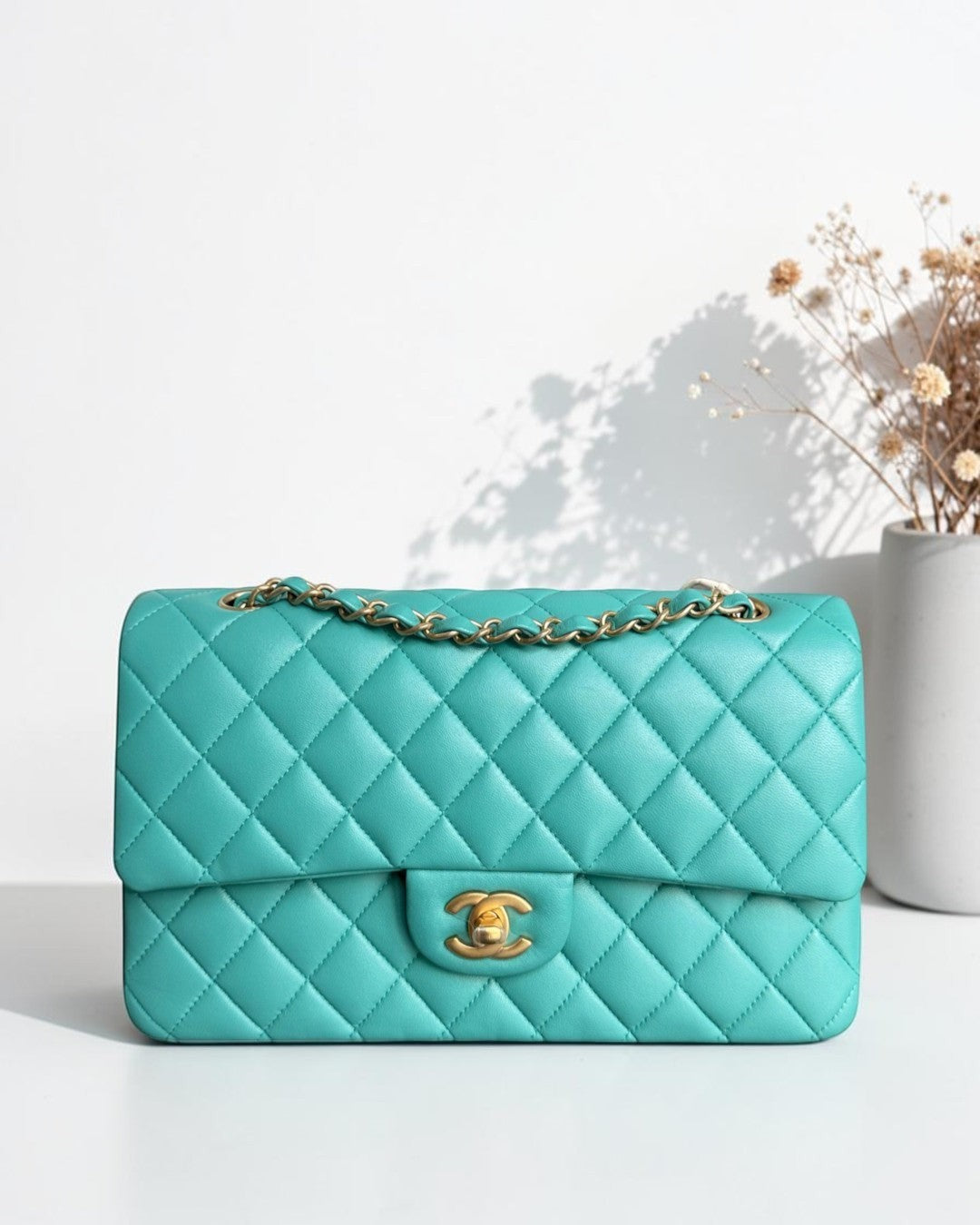 Luxury Evermore Chanel Classic Flap Medium bag in teal quilted lambskin with gold hardware and chain strap