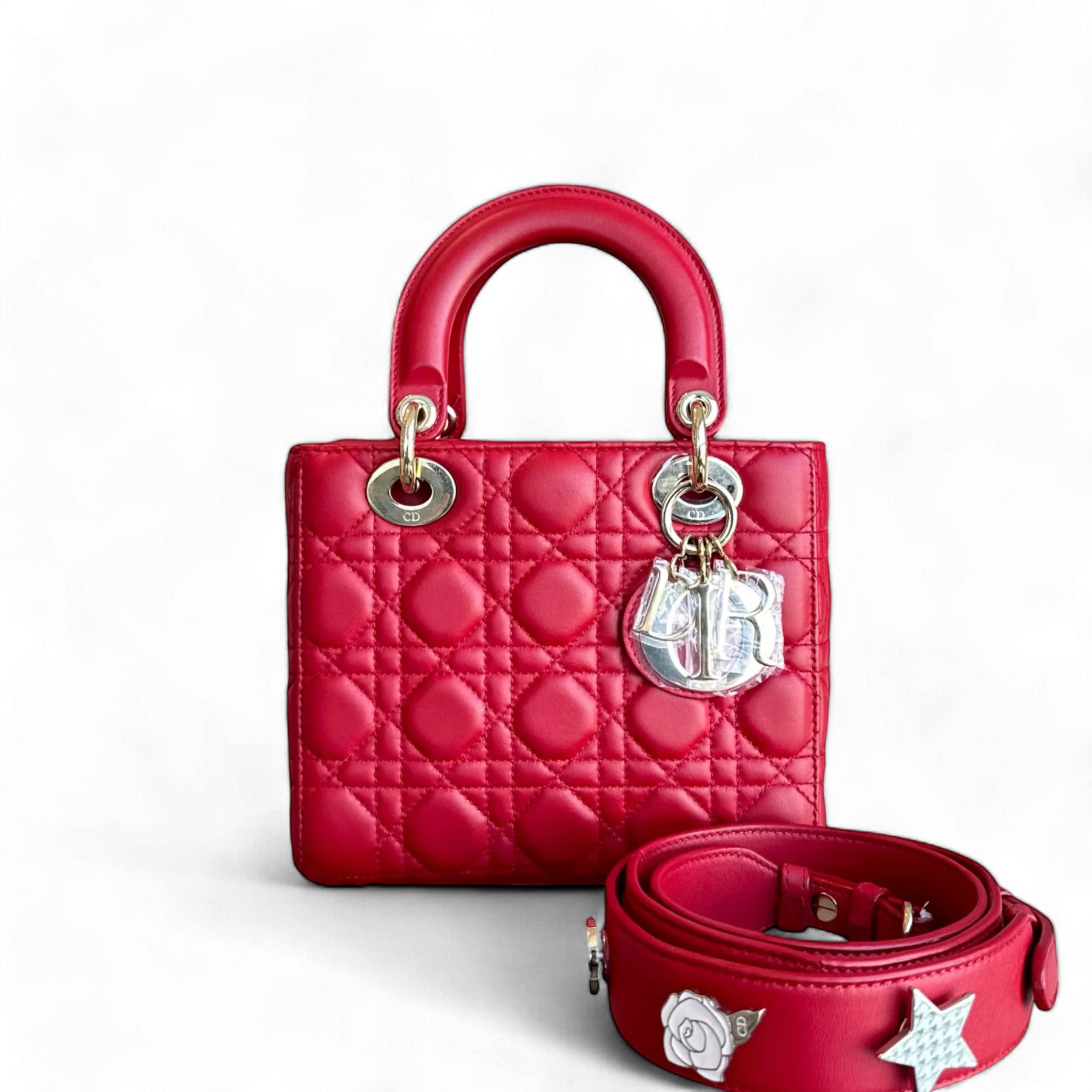 Luxury Evermore red lambskin Dior Lady Small Flap bag with gold hardware and Cannage stitching. Includes interchangeable charms.