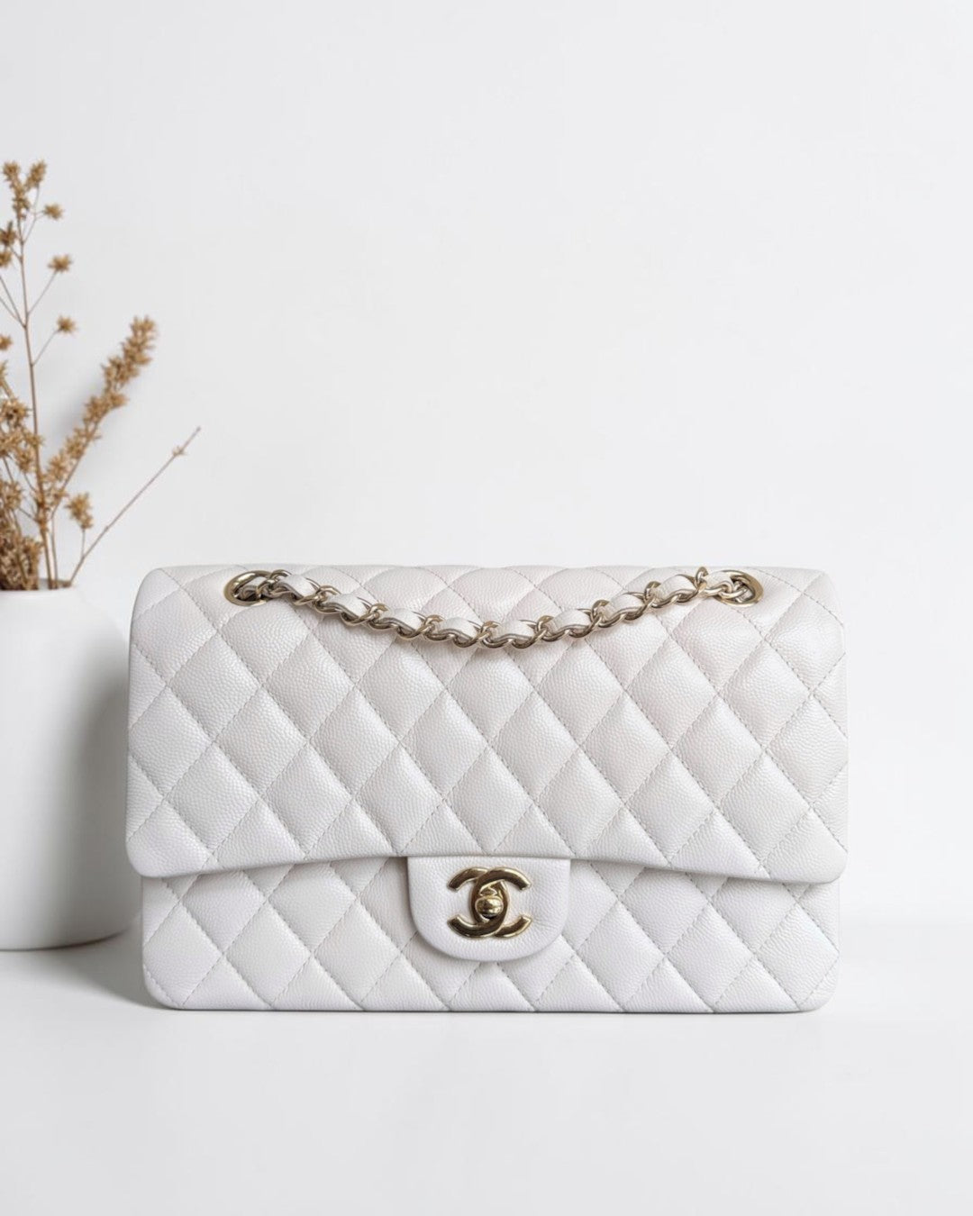 Luxury Evermore white quilted caviar leather Chanel classic flap bag with gold tone hardware and chain strap