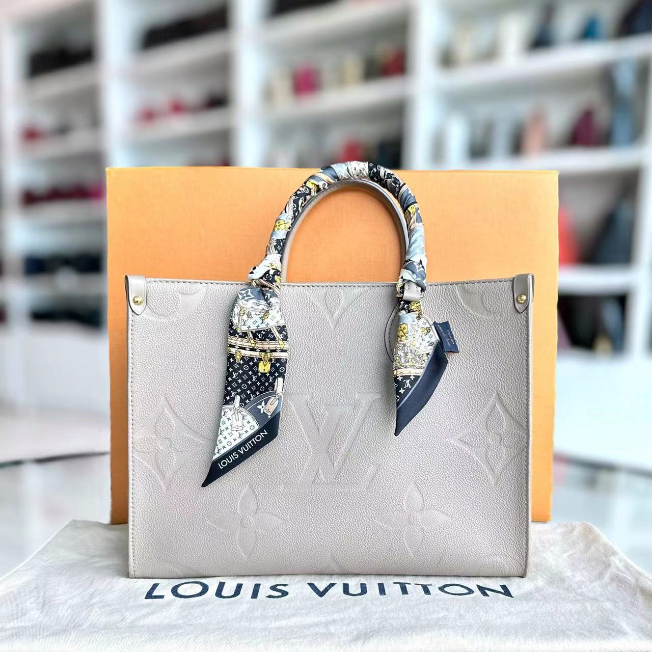 LV Louis Vuitton OnTheGo MM On The Go Monogram Empreinte Tourterelle Grey - Luxury Evermore