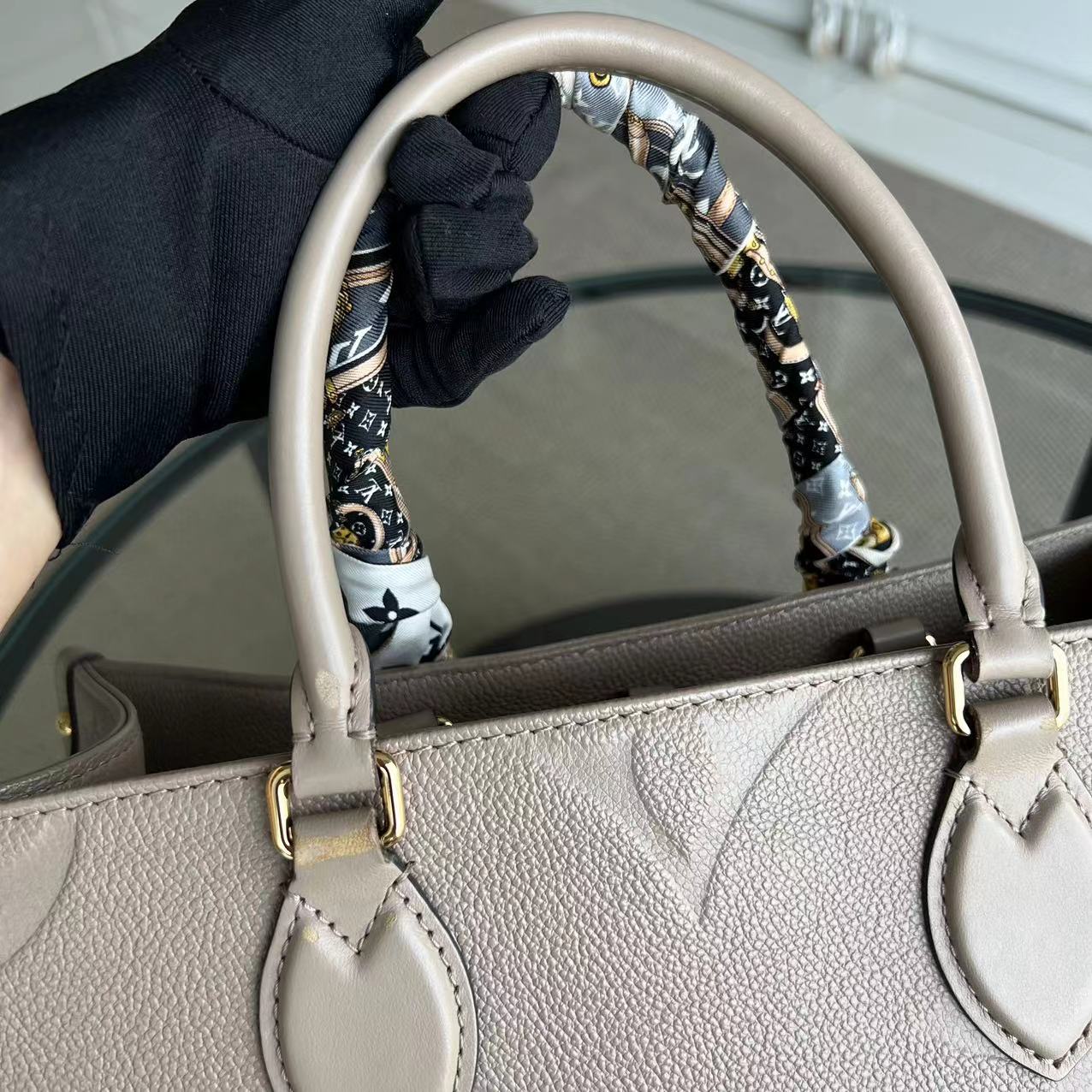 LV Louis Vuitton OnTheGo MM On The Go Monogram Empreinte Tourterelle Grey - Luxury Evermore