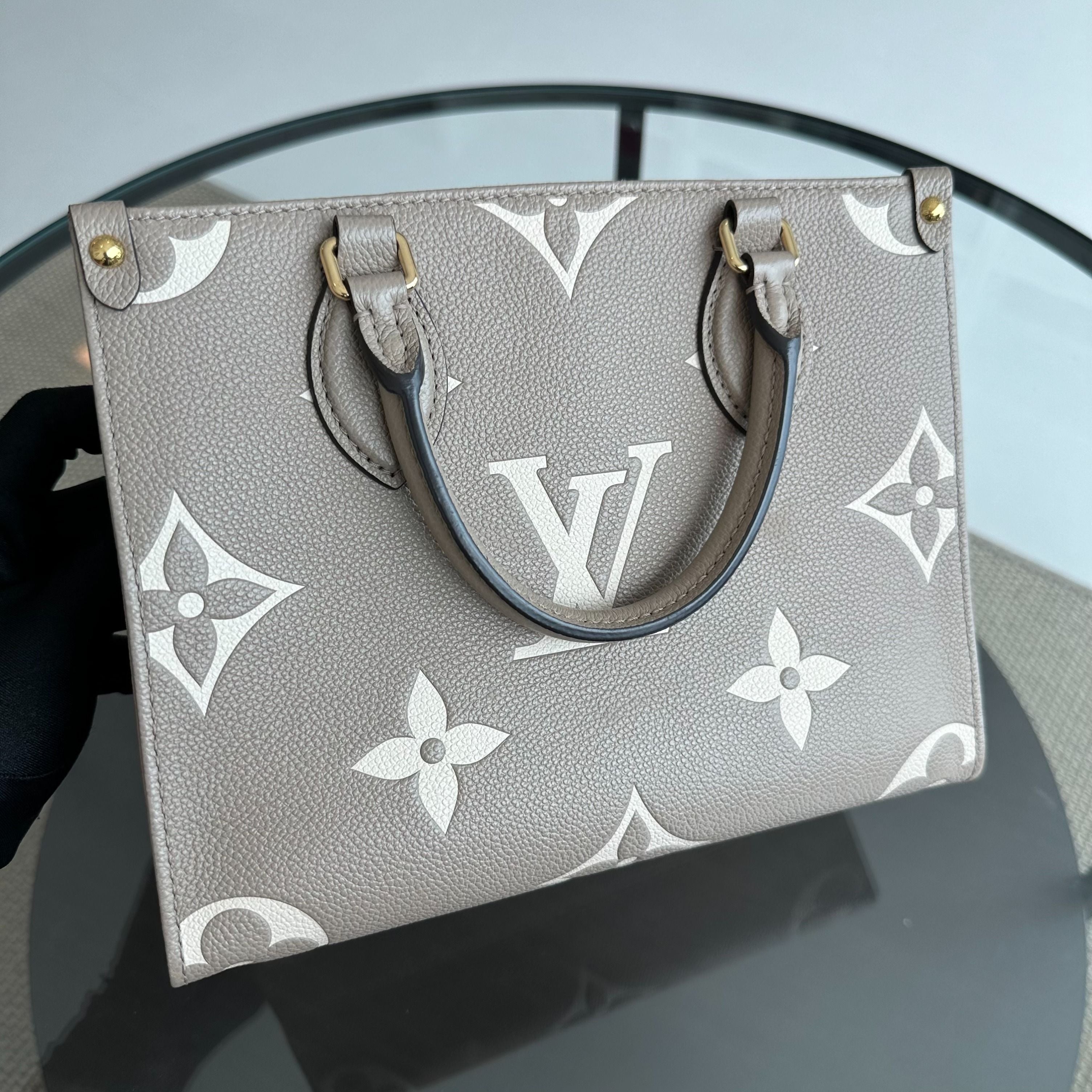 LV Louis Vuitton OnTheGo PM On The Go Empreinte Grey Cross Body Bag - Luxury Evermore