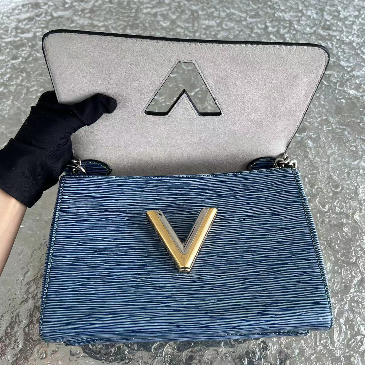 LV Twist MM EPI Leather Light Blue Two Tone Hardware Louis Vuitton - Luxury Evermore